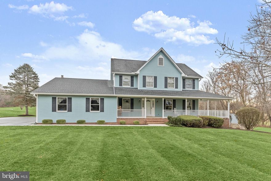 Discover the perfect blend of style and comfort in this captivating residence set on 3 acres of beautifully landscaped grounds.  The large sunroom welcomes you with accent wood walls and a high vaulted wood ceiling adorned with skylights, creating a bright and airy inviting space. The updated kitchen is a chef’s delight, featuring Silestone countertops, Italian porcelain flooring, a breakfast area, and a new smart oven, refrigerator, and dishwasher. A brick accent wall framing a wood burning stove becomes the focal point of the off-kitchen family room offering new carpet.  Formal living and dining rooms provide an ideal setting for entertaining guests or enjoying family gatherings.  Retreat to the primary bedroom with an en suite bathroom, where luxury awaits with a jetted, soaking tub, separate shower, and dual vanity.  Three additional bedrooms and a hall bath complete this level.  The finished lower level provides a recreation room with new LVP flooring, access to the yard,  and abundant storage space, providing additional living space and versatility. Outside, a wraparound porch invites you to relax and take in the scenic views and you can gather around the firepit for cozy evenings.  Plenty of parking on the long, turnaround driveway and 2 car garage, plus 2 storage sheds for your convenience.  Additional updates include the water heater, paint, gutters with leaf guards, office windows glass, front storm door, and more!  This property is a true haven.