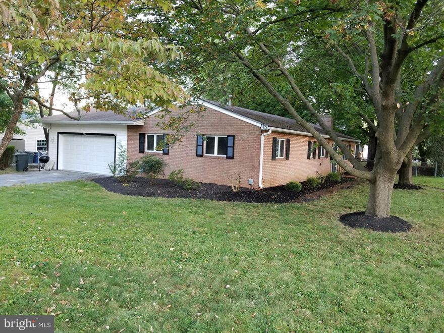 Spacious all brick rambler on .30 acre for the price of a townhome! Remodeled kitchen and bath! Large great room features a gas fireplace and a vaulted ceiling w/wood beams! Two sliding doors open to a huge, private concrete patio! Attached 2 car garage w/attic storage! Fully fenced back yard w/large storage shed w/electricity! Close to schools and shopping. New driveway being installed this week!