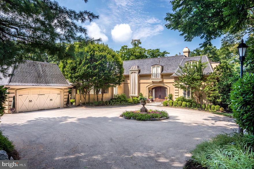 Exquisite in every way, this impeccably-renovated 6-bedroom, 5.5 bath French Colonial estate on 1.79 acres is luxurious and pristine, inside and out. Gracing the stunning, expansive private grounds is a fabulous heated in-ground swimming pool with hot tub and patio, and full-size tennis court creating a resort-like setting. Approaching the residence through a beautiful tree-lined paver-stone driveway begins the elegant experience. Upon arrival, a large circular drive centered and surrounded by beautiful plantings sets a sophisticated tone. Lovely lush gardens, a tranquil fountain, stretching lawn, peaceful paths and wooded areas imbue a state of bliss. Inside is equally impressive, welcoming you with a gracious foyer featuring a grand turned staircase, Palladian window, and rich wood floors. Entertaining is a dream in the great room with a fireplace, four sets of glass doors leading out to the rear deck and bar with built in seating, beverage drawers, wine fridge and ice-maker. Host a large crowd in the regal dining room graced by a vaulted ceiling with exposed beams. The spectacular, renovated chef s kitchen is the heart of the house, finely designed with Century cabinetry, top-of-the-line stainless steel appliances, 2 huge islands, & butler s pantry. Open to the kitchen is the family room with high vaulted ceilings where you can enjoy a favorite movie with the family, or step out glass doors to the rear oasis to relax on the patio, take a swim, play tennis, or enjoy the views. Also on the main level is a powder room, and spacious office, which was once the master bedroom, complete with a full bath, and doors to the deck. Awaiting to indulge you on the second floor is your master bedroom suite with a huge walk-in closet and deluxe spa bath. Two additional bedrooms share a jack & jill bath, and bedroom 4 is en-suite. The finished day-lit, walkout lower level is a haven unto itself, with a recreation room, gym, bedroom, full bath, and laundry. This home is truly magnificent, located on a quiet street in a great Penn Valley location, convenient to it all.