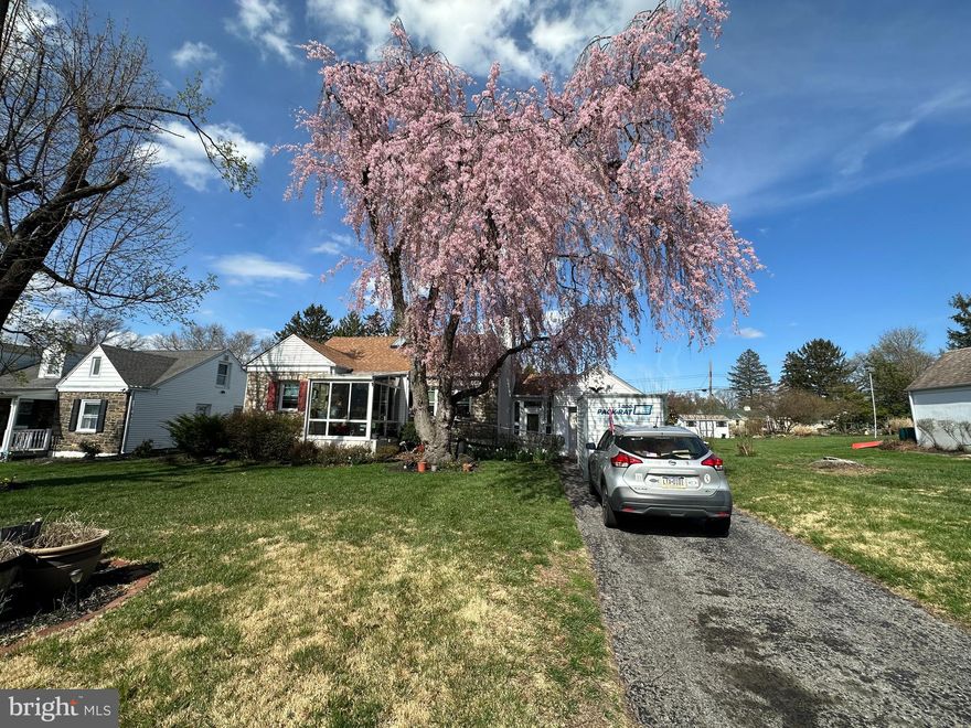 Wonderful single cape  in prime West  Norriton ! half a block from Norristown Farm Park and walking trails !! Walking distance to Grade school and High School !!  Near Elmwood Park Zoo , Germantown Pike to  Turnpike !!
Nice front lawn and 3 car driveway  leading to a large oversized  garage  with auto door opener .  Metal front handicap  ramp . Lovely  front sunroom/greenhouse room  with ceramic tiled flooring. Formal living room with laminate flooring , crown moldings , stone fireplace with wood mantle . Formal dining room with ceiling fan light , newer windows , crown molding. Large kitchen with electric range , ceiling fan light, tiled back splash , microwave, white cabinets, granite countertop, double stainless steel  sink , stainless steel refrigerator, newer window facing rear yard . Covered breezeway  with ceiling fan light leading to large garage storage area and attic access for additional storage . Exit door to lovely rear yard and cement patio . Storage shed behind garage .
 Enter the large semi finished  basement from kitchen , basement has a newer oil tank , washer and  dryer  laundry area in the basement . Sump pump with battery back up . 200 amp breaker box . Basement drainage system , bi fold doors to rear yard . Newer Bosch air handler for central air . Newer oil hot water radiator heater , newer  oil hot water tank  . Block foundation . Good height for easy finishing . Hall coat closet . Hall bathroom with vinyl floor, tub/shower  combo , ceramic tiled walls and large sink cabinet,  linen closet behind the door . Bedroom 1 with ceiling fan light , crown molding, laminate floor, closet . Bedroom 2 with laminate flooring, ceiling fan light , closet behind door. 

2nd floor  offers the  large primary bedroom  
with living room area , office/den/storage room  , laminate flooring , vaulted ceiling, ceiling fan light , wall ac and heat unit  , walk in closet , large full bath with vinyl flooring, large stall shower , sink cabinet, linen closet ,modern windows . 3 skylights !  What a grand primary bedroom !!
Dont miss this opportunity to own a wonderful single home . Newer shingle roof , newer heat and central air , large .26 acre lot , over 1750 sq ft of living space !! schedule your private tour today !! 
Professional photos coming soon !
