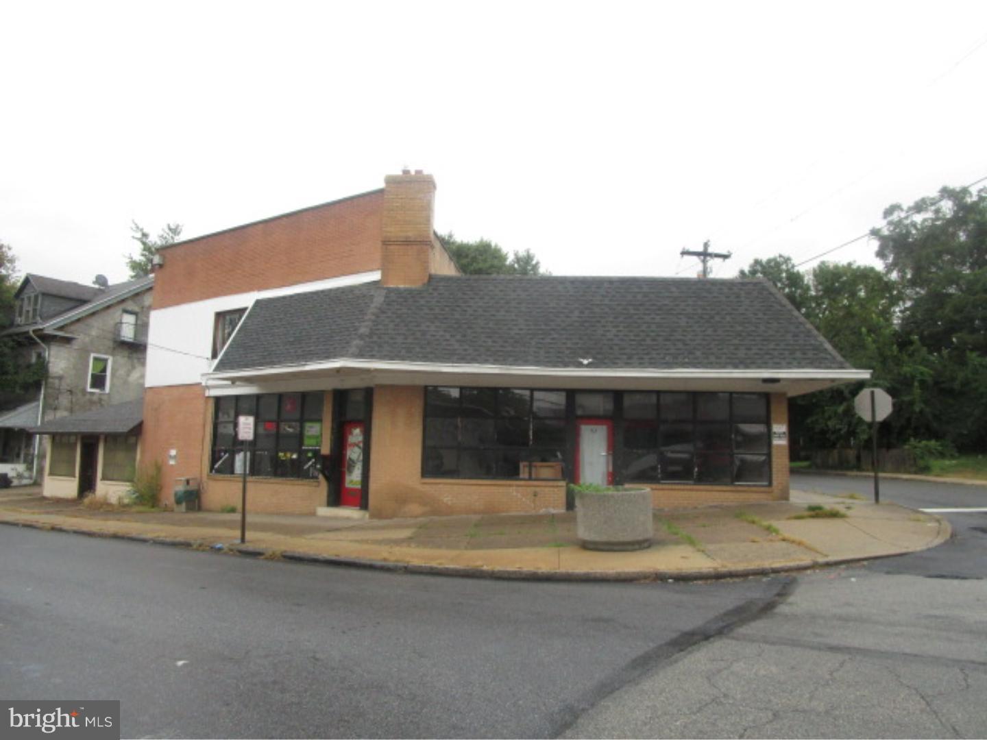 Large, corner commercial property consisting of 2 storefronts on the 1st floor and a large, 3 bedroom apartment on the 2nd floor. Rear garage entrance for commercial deliveries plus parking lot for lot cars. Highly visible intersection on Upland Ave with a high volume of traffic. Property being sold strictly As Is. Buyer is responsible for ordering the Use and Occupant Certification. Buyer is responsible for ordering the Tax Certs.