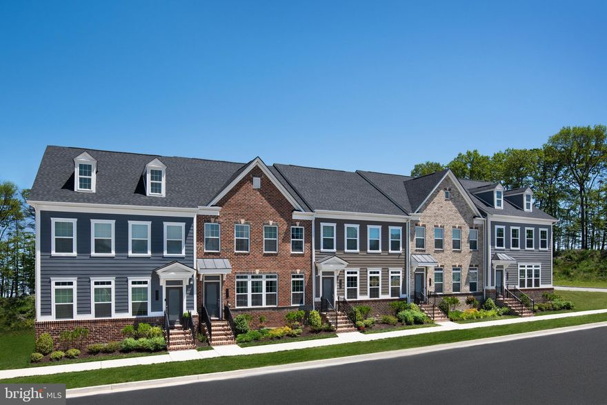 The new Andrew Carnegie townhome is where luxury and convenience converge. Easily enter the 4 bedrooms and 3.5 bath partial brick front home home with a spacious main level where the bright and airy gourmet kitchen features an impressive island. A large dining room and the great room are found just off the kitchen on either side. Upstairs, 2 large bedrooms and a full bath provide comfort to family and friends. The luxurious owner's suite features a bank of windows, optional tray ceiling, 2 walk-in closets and a double vanity bath.  The fourth level provides a full bath, a bedroom or entertainment loft, and access to the rooftop deck.  A finished rec room and 2-car detached job completes this stunning home.  Photos show color selections and were taken in a model. Come discover The Andrew Carnegie.