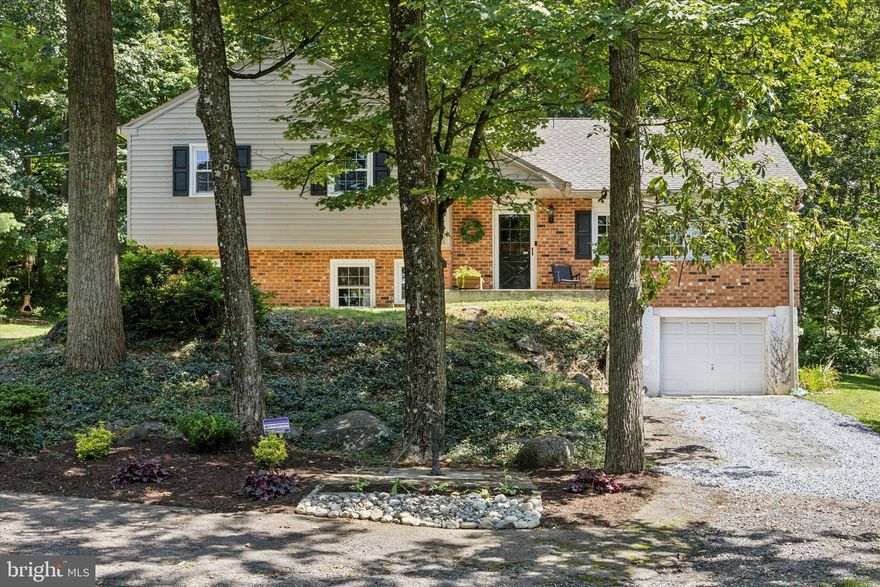 Discover timeless charm and modern upgrades in this beautifully  maintained 4 bed/2.5 bath home nestled on a .62-acre lot in Pottsgrove school district.  From the moment you arrive, you'll feel the warmth and serenity this property offers.  Step into a spacious living area with hardwood floors. The heart of the home is the fully renovated eat-in kitchen, complete with granite countertops, stainless steel appliances, and direct access to the backyard patio, ideal for that morning coffee or summer barbecues.
Adjacent to the kitchen is a dining room—perfect for elegant dinners or lively gatherings, ready to adapt to your lifestyle.   Upstairs, the primary suite features its own bathroom, accompanied by two generously sized bedrooms and an additional full bath. A charming bonus room or fourth bedroom with two large closets rounds out the top level.  The lower level invites cozy evenings with its brick arch accents, wood-burning fireplace, and brand-new flooring in the family/recreation room. This space also provides convenient access to a storage/utility room and the attached garage, adding both function and flexibility. A renovated powder room completes the lower level. In the recreation room, existing plumbing opens the door for a future wet bar installation—a perfect upgrade for entertaining guests or enhancing your personal retreat.  Enjoy peaceful views and privacy from your tree-lined backyard oasis. This home features a newer roof (2019), new water heater (2024), brand-new fridge and microwave (2025), washer and dryer (2023), french drain and sump pump installation (2023), and windows with a transferrable warranty. Hardwood floors and neutral paint throughout.  This home is a must-see.  Property is priced to be sold in AS-IS condition.  Septic, home inspection, radon, termite, and well water reports are available upon request.  Schedule your showing today!