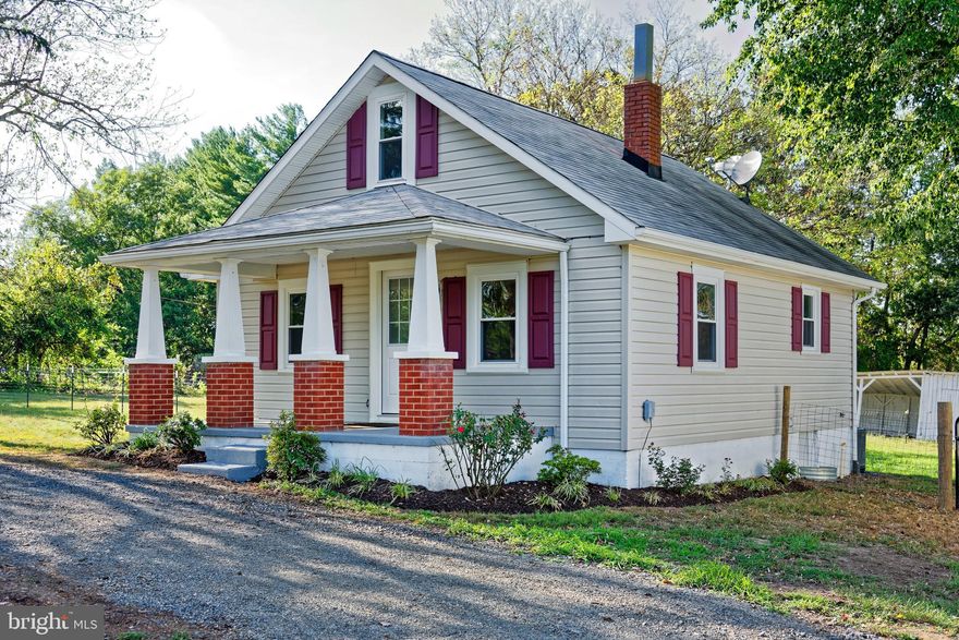 Welcome to your new home in Midland! Situated on 2.25 open acres is this charming and fully renovated 3 bedroom, 2 bath cottage. Step up onto the covered front porch and enter the home that has been freshly painted inside and has brand new carpeting.  Enter into the light filled living room with built-ins and a stairway to the 2nd floor. Continue back to the country kitchen with all stainless steel appliances. Just off the living room is the primary bedroom suite with an ensuite bath. Passed the kitchen is another guest bedroom and a separate full bath. At the back of the house is a mudroom with a boot sink and a separate back entrance. From the living room are stairs up to an upper bedroom suite. Take the stairs to the lower level and there is the laundry room with utilities and areas for storage. The property includes an oversized detached 1-car garage.  And bring your animals as there are two fenced paddocks and a small barn/shed. Property is move in ready.
