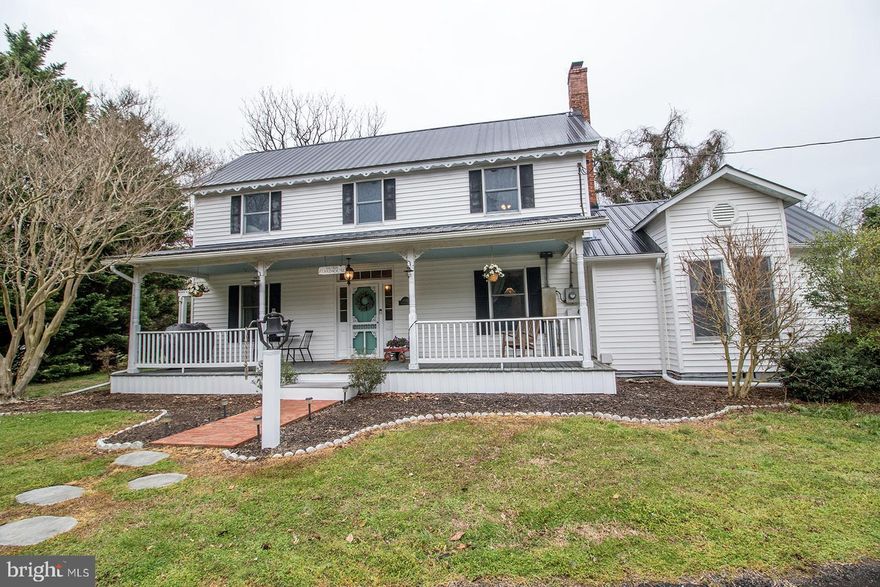Welcome home to "The Olde Farmhouse"--wonderfully  restored, 4 bd, 2.5 bath authentic farmhouse -Not a cookie cutter, and so full of character and charm —features  tin ceiling/walls, exposed brick, original early 1900s wood flooring, original wood gingerbread trim at the roofline, plus magnolia trees lining the driveway -recently remodeled to bring out lots of original charm— with a few modern touches including, all new stainless steel appliances, spacious kitchen with farmhouse sink, bathrooms completely renovated with new plumbing, original hardwoods upstairs refinished, recently installed mini split heating and air units on the main floor, central air upstairs, hardwood floors throughout, large walk in closet off the master bedroom -new metal roof, huge yard of 2.4 acres with room on lot to build a garage , 1,000 square foot original shed with new metal roof and lean to, tucked into a quiet neighborhood but secluded by trees for privacy, screened in porch, large front porch, fenced in backyard with large concrete patio.