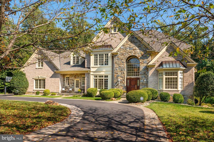 Spectacular custom build French Country colonial on quiet tree-lined cul-de-sac on the river side of Riverwood Drive, just one mile from Potomac Village.  The interior offers a wonderful sense of space with high ceilings, big windows with great natural light and an open floor plan.  It's got an easy California-vibe feeling offering comfortable living spaces.  The home is solidly built by the well-known builder, Chris Bogdan of Bogdan Builders, with exceptional finishes - a gorgeous paneled library with carved shell detailing, a limestone fireplace mantel in the family room, rounded edges on all the walls, big picture windows, hardwood floors throughout the main and upper levels, a secondary staircase and a full daylight, walk-out lower level.  The lower level includes a large recreation room, exercise room and Au Pair Suite.  You will also appreciate the mudroom area, walk-in pantry, upper level laundry room and the back staircase. It's truly a home for a lifetime!  Enjoy beautiful sunset vistas and a gorgeous private setting backing to woods.  The privacy is incredible!!  Just one mile from Potomac Village, commuting is a breeze!  Access to the popular C&O Canal/Swains Lock is nearby.  Churchill School Cluster.  Move in before the holidays and celebrate Thanksgiving in this stunning home!!