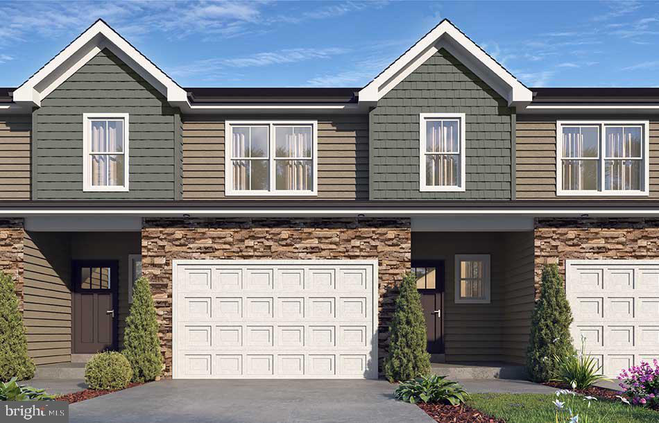 🏡 Fleetwood’s Newest Showstopper — The Addison is Back! Back by popular demand, the Addison townhome is making a grand return — and it’s better than ever! LOT 20 is an INTERIOR UNIT. This gorgeous, modern craftsman-style home turns heads with its eye-catching stone facade, shake accents, and charming front door. The heart of the home features a stunning, upgraded kitchen with a center island — perfectly connected to the dining and living spaces for easy entertaining or cozy nights in. The open living spaces is a wide open, soaring great room with vaulted ceilings that instantly feels bright, airy, and welcoming. Rear sliders lead to composite decks or concrete patios, depending on grade. Upstairs, the spacious primary suite is your private retreat, complete with a primary bath with double bowl vanity and a walk-in closet big enough to impress. Two additional bedrooms, a full bath, and an oversized linen closet offer space for everyone. These townhomes are designed with three professionally designed color palettes — so whether your style is bold, warm, or cool and modern, there’s an Addison that fits your vibe. Plus, this is truly low-maintenance living — the HOA takes care of lawn care and snow removal. Pair that with an oversized one-car garage and a location in charming Fleetwood, and you’ve got the ultimate in carefree, luxury townhome living. One more thing...backed by the one-year Builder Warranty, we've got you covered!