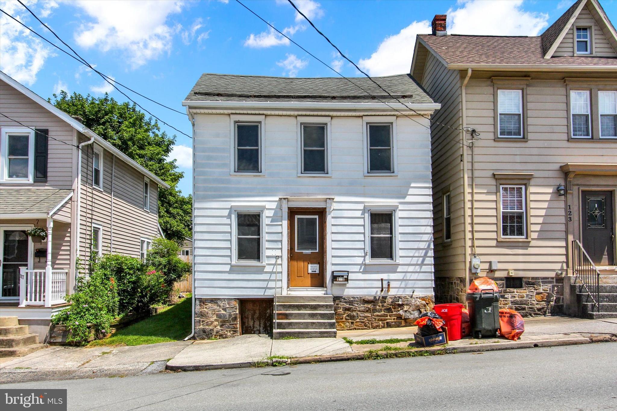 Welcome to 121 S. Baltimore Street in Dillsburg, PA. This house is priced to sell quick. This 2 bedroom, 1 bathroom home is move in ready with the bones to allow for improvements over time to make your investment into what you want it to be. The first floor has a living room, dining room and kitchen, with the laundry on this floor so you don't have to go to the basement to do the laundry.
The second floor has the primary bedroom that was 2 bedrooms converted into 1, giving the primary bedroom a bigger closet and more space to be comfortable. The second bedroom also has the entrance to the attic. The bathroom was renovated with a nice stone façade and stand up shower, being more efficient with the space and making it easier to walk through.
You're close enough to the central area of Dillsburg that you can walk to the Pickle Drop, but you have a yard big enough to escape the hustle and bustle and create a sanctuary for yourself. The detached garage doesn't have an electric garage door opener, but there is enough space to park a car. There is a smaller garage to the side of it that was used by the previous owners for their motorcycles.
Please reach out to your agent and schedule a private showing today!