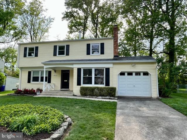 Welcome home to this beautiful, newly updated, colonial home in Manor Woods! 4 bedrooms with 2 and 1/2 baths on one of the best lots in the neighborhood. The entire house has been freshly painted, the bathrooms have been updated, and there is brand new carpet in the sunroom and family room. The eat in kitchen has custom built maple cabinets, granite countertops and all new appliances. On the main floor, you will find a light-filled living room, dining room and family room with beautiful original site-finished hardwood floors throughout the home. A powder room and laundry room are conveniently located on the main floor. Off the dining room is a large sunroom with HVAC that makes it perfect for gatherings with family and friends. The sunroom overlooks a beautiful, HUGE, and flat back yard, which also includes a large storage shed. There are four bedrooms upstairs, including an ensuite primary bedroom. Attached to the home is an oversized 1 car garage with an extra room with a workbench and plenty of storage space. There is also an unfinished walkup basement with several windows. Perfect neighborhood location less than 1 block from a Blue Ribbon Elementary and Middle School, community pool and Rock Creek Park. This home has it all!