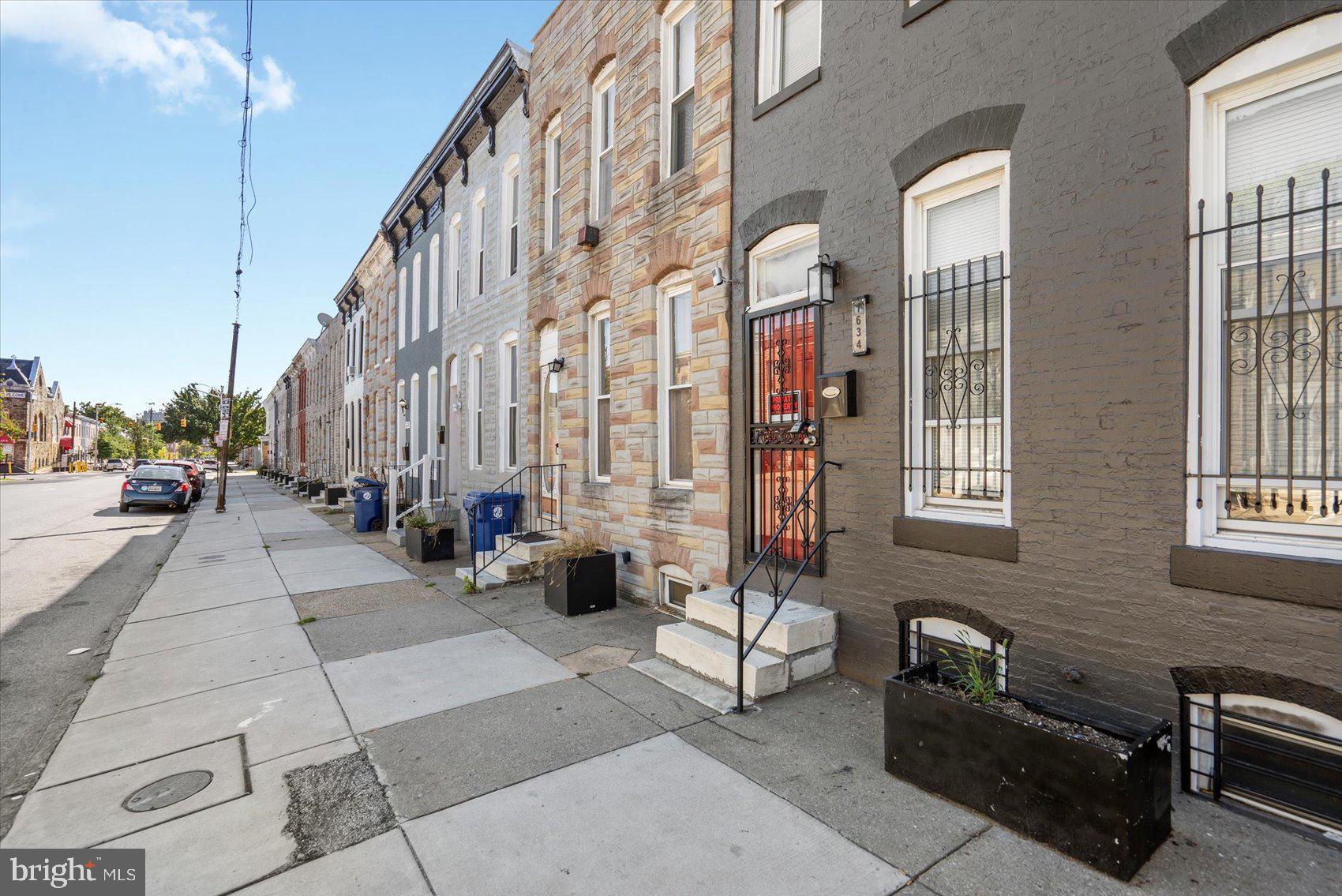 Newly refreshed 3BR/2.5BA Townhome located on a quiet street.  Step into a home filled with natural light, a freshly painted interior, easy care flooring, and three floors of living space.  The main floor offers a spacious living room with a custom feature wall, a half bath, and an eat-in kitchen with newer cabinets and countertops.  On the second floor is a spacious primary bedroom with a private bath featuring a walk-in shower. In addition, there are two sizable secondary bedrooms and a full bath.  The lower level offers finished living space, storage, laundry, and a walk-out to Bilco doors in the fenced yard.  The yard is in need of some TLC but with a bit of imagination this space can become your backyard oasis.  This home is move-in ready and is located in close proximity to shopping, restaurants, and commuter routes.