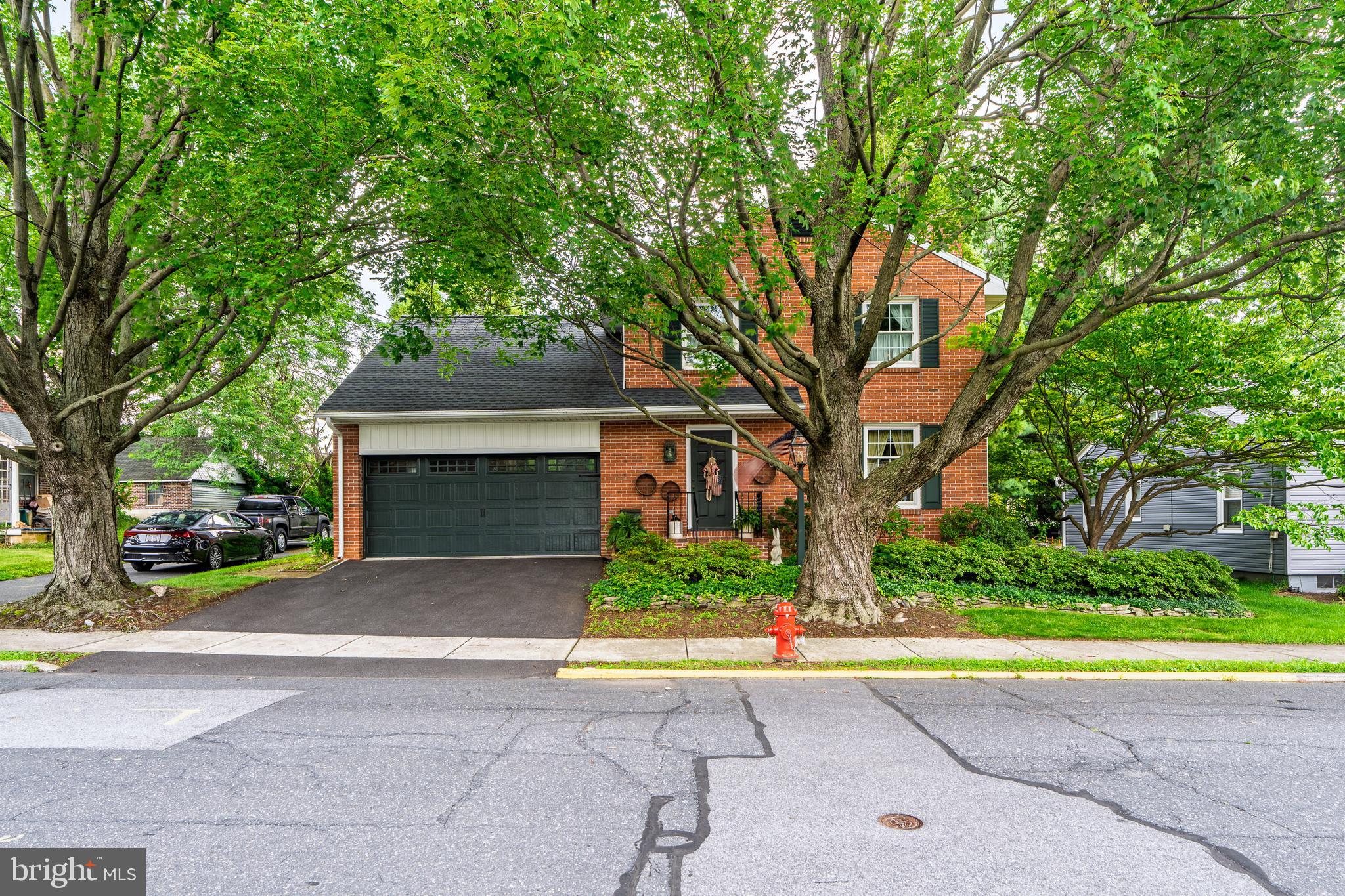 This one is a hidden gem, right in the heart of downtown Lititz! And it is all brick! Hard to find! Beautiful hardwood floors enhance the foyer and lead you into the living room, complete with a fireplace and adjoining dining room. The lovely hardwood flooring continues into the spacious kitchen, with plenty of cabinets, pantry space and updated countertops. Adjacent to the kitchen is the first-floor laundry room. And, of course, the spectacular sunroom that overlooks a gorgeous fenced-in backyard. Enjoy relaxing in this private space! To the back of the yard is a large shed, which could easily be used as a craft room or just a great hide-a-way! The second floor of this home features four bedrooms, all nicely sized! And don't miss the beautifully updated bathroom! The basement is finished and features a room that would be perfect for an office. This home has been lovingly cared for and maintained by the current owner. Move right in and enjoy this truly one-of-a-kind home that is located within walking distance to everything historic Lititz has to offer. The children can walk to school and there is a great playground, just one street over. Or walk into town and enjoy a cold beverage or a great meal, and, of course, Lititz Springs Park is an easy walk, as well! Seller has lived in the home for many years and raves about her neighbors and the neighborhood!