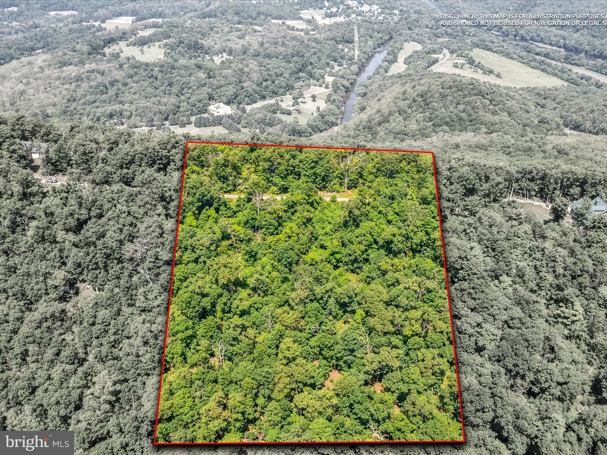 For those seeking privacy, security, and natural beauty, this 10 acre property within a gated community is an ideal choice. Its hilltop position offers a potential panoramic view, complemented by the property's beautiful hardwood trees and natural stone. Restrictions apply to protect the community's natural charm, and easy access makes this a perfect opportunity for a luxury home or investment. NO AirB&B's or short term rentals allowed.