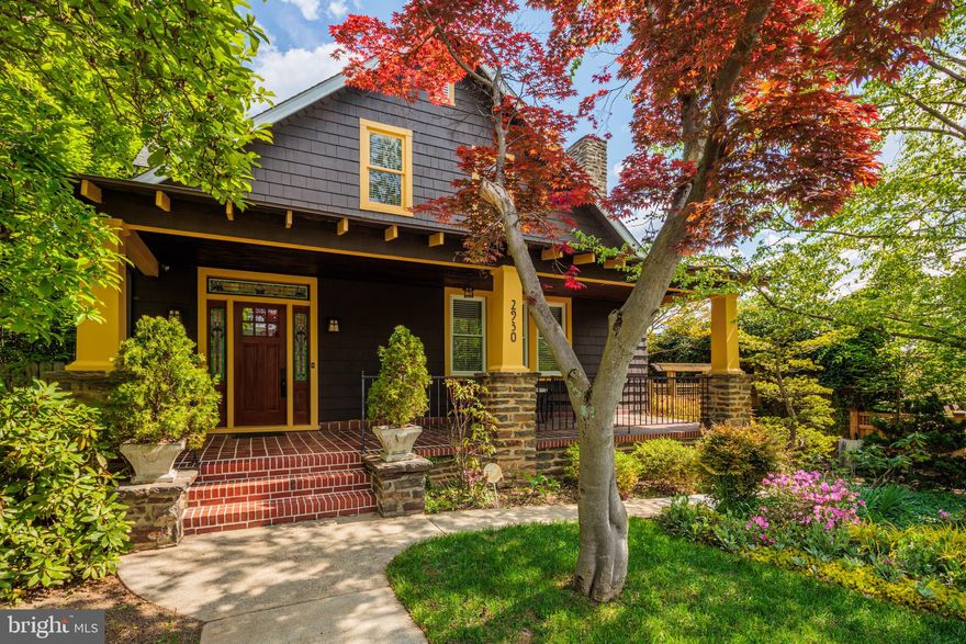 MULTIPLE OFFERS- please submit offers by 5pm Sunday Apr 30. This historic home is in pristine condition. Renovated with impeccable craftsmanship and detail to keep its historic charm while offering all the modern comforts. Stained glass windows, tall ceilings, original doors, hardwood flooring,  original wood trim and baseboards  are just a few of the details you will notice upon entering this truly one of a kind property. 
It has five bedrooms and three full bathrooms. The fact that is has about 4000 sq. ft. of livable space including two kitchens and two laundry rooms makes it perfect for a large family,  separate in-law space or room for adult children. This home is also perfect for a buyer looking for a unique home with exquisite custom details. 
Before entering the home,  pass through a large front porch with restored original wood beams. Walk through the gorgeous stained glass trimmed front door into the grand foyer which welcomes you into the living room with the original wood burning fireplace. Pass through the separate dining room into the custom kitchen with granite countertops and stainless steel appliances. The first level continues around to a full bath with a custom tile shower,  jetted tub and two large bedrooms. 
Upstairs are three bedrooms, all with large walk in closets. There is another full kitchen (with KitchenAid appliances and quartz counters) and a laundry room on this upper level.
The basement is beautiful. Plenty of space for an office, kids' play room or man cave.  Another full bath and laundry room, as well as a large storage area, are also found on this lower level. 
There is a 2 zoned HVAC system (one for the top level and the other for the main and lower level).  Radiator heating is intact and available as a primary or supplemental heat source.  Private driveway. 
The fenced yard is very private and simply an oasis. With it's lush greenery and flowing pond, it's truly a place of  tranquility.