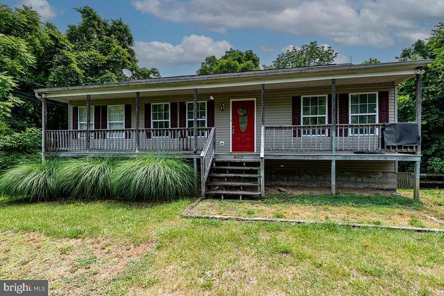 Spacious Rancher on an open Almost Acre lot! Country kitchen with sliders overlooking large Yard. Freshly painted and new carpeting to be installed before move in. Charming front porch to enjoy the quiet country setting.