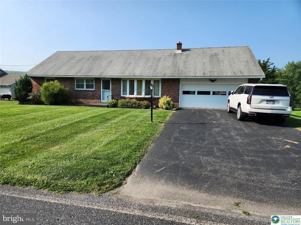 Come enjoy this three bedroom, one bath ranch home in Berks County. This home offers an updated kitchen, dining area and family room, spacious closets in each bedroom, an attached garage, spacious enough for two cars. A backyard with an outside shed that's perfect for extra storage space. Rent includes water, sewer, lawn care.