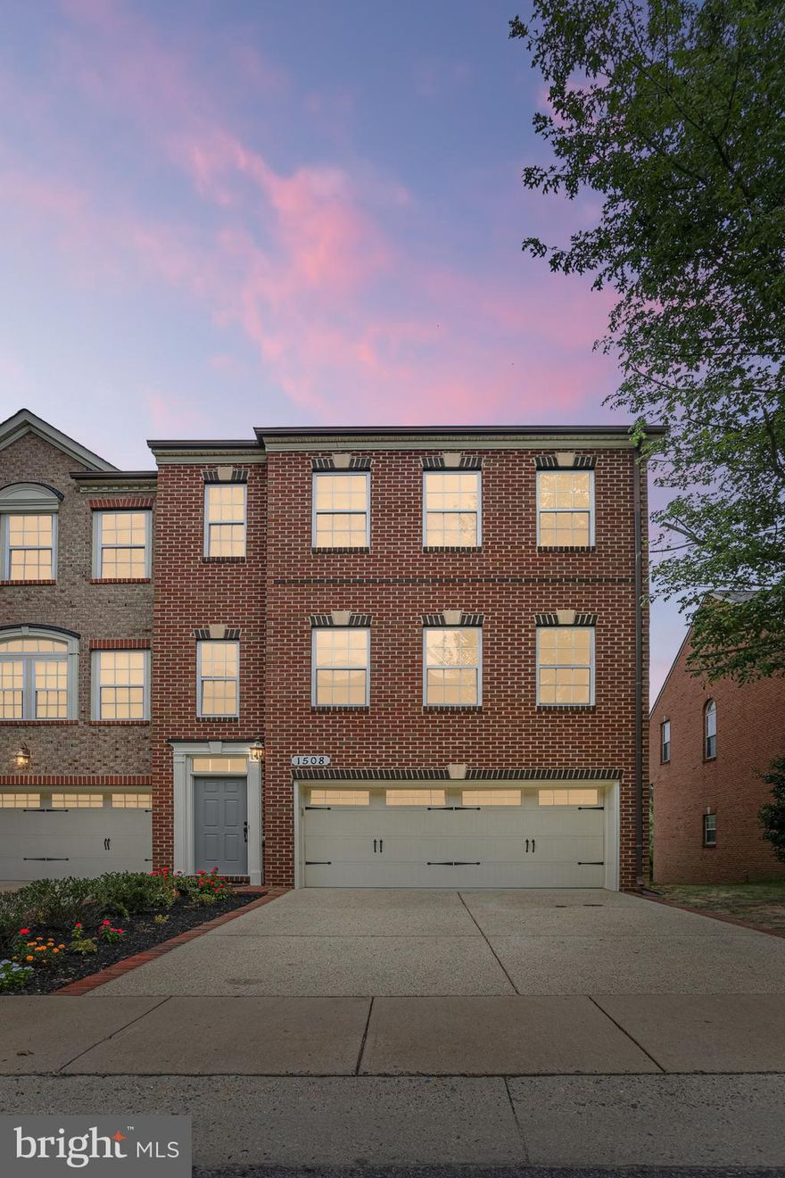 Welcome to this stunning, move-in ready, all-brick luxury end unit townhome. Featuring an expansive 3-level bump-out, a front-entry 2-car garage, and a spacious concrete driveway/walkway, this property exudes elegance and comfort.

Upon entering, you will be captivated by the dramatic open 2-level foyer, adorned with designer stamped-patterned carpet that extends throughout the upper and lower levels, as well as the staircases. The lower level offers a private rear entry, a vast recreation room, a kitchenette, and a full bathroom, along with a separate entrance from the garage. This versatile space can serve as an in-law suite, guest room, or recreational area, providing endless possibilities.

Ascend the stairs to the main level, where you will be greeted by tons of natural light and beautifully refinished white oak floors that flow seamlessly throughout. The open floor plan seamlessly connects the living room and dining room to  provides ample space for entertaining guests or relaxing with family. The gourmet-style kitchen boasts new stainless steel appliances, granite countertops, 42-inch maple cabinets, a center island, a large pull-out drawer pantry, and abundant storage space. Adjacent to the kitchen, you will find a cozy eat-in area, perfect for quick meals, and an additional living area ideal for entertaining. Step outside onto the maintenance-free composite deck with white vinyl railings, overlooking a serene private common area, and enjoy the tranquility of your surroundings.

The upper level comprises three bedrooms, two full bathrooms, and a conveniently located side-by-side new washer and dryer. The spacious primary bedroom suite features vaulted ceilings, a sitting area, and an expansive walk-in closet. The luxurious 4-piece primary bathroom showcases designer ceramic tile flooring, a double vanity, a separate water closet, a two-person soaking tub, and an oversized walk-in shower with bench seating and a glass enclosure. Additionally, there is a bonus storage closet under the stairway to the upper level.

Every detail has been meticulously considered, from the fresh coat of paint to the elegant crown molding, 9-foot, cathedral, and vaulted ceilings, upgraded lighting, and intricate molding package throughout. 
 Situated in a prime location, this property is conveniently close to retail stores, restaurants, public transportation, the new Adventist hospital, and the new FDA headquarters. Commuters will appreciate the easy access to ICC, Route 29, I-495, and I-95.

Don't miss this opportunity to own this exceptional luxury townhome, where comfort, style, and convenience converge.