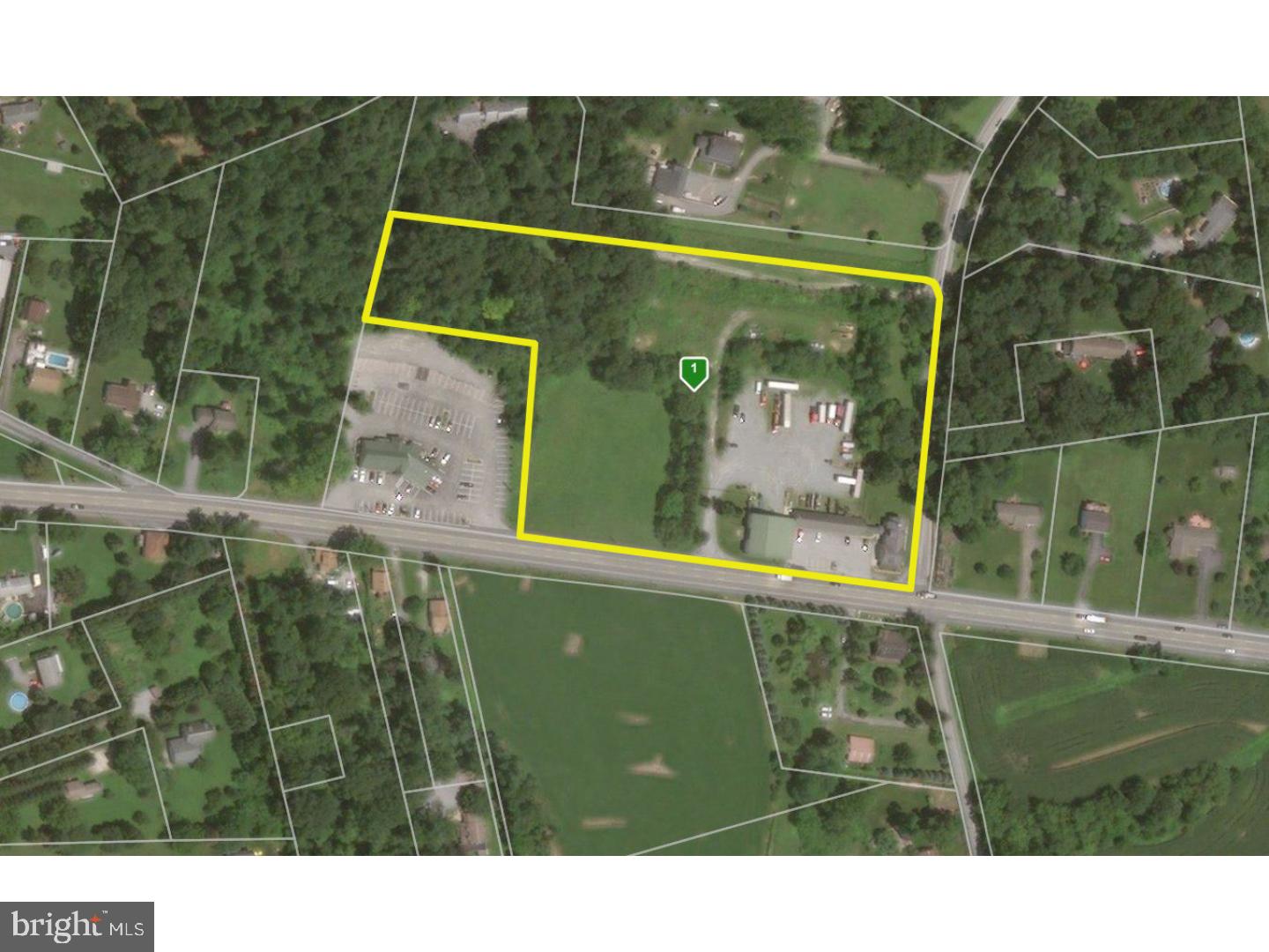Office Warehouse - Corporate offices and warehouse space located on 8.7 acres (378,972sf). GBA= 11,195sf Rentable area is comprised of 6,645 sf office space and 4,550 warehouse space. The improvements were constructed in 1780-1850-1932 and renovations took place from 2001-2005. The 2-story farmhouse office building is built on concrete foundation and has full, unfinished basement. Ceiling heights range from 8ft in the 2-story office building to 12ft in the 1 story building. Warehouse ceiling heights are 13-23ft. The main 2-story office building contains main reception area, staff support area, 7 private offices, a conference room with kitchenette, copy and file rooms, shared staff support office and rest rooms on each floor. The 1-story office building features 1 private office, open staff support area, a meeting/training room, and a set of restrooms with lockers. Office areas have painted sheetrock or vaulted ceilings with exposed ductwork and are heated and cooled by Goodman gas-fired (split system) forced warm air systems. The warehouse space is a converted barn of open interior space (second floor removed) with sealed concrete slab floors and is heated by Goodman gas-fired forced warm air systems. All buildings have a monitored central fire and burglar security system and smoke detectors. This site is generally level at grade along Lincoln Highway with 627ft highway frontage on US 30 and 460ft on Mt. Vernon Rd. 3 curb cuts on Lincoln Hwy. The site is serviced by an on-site well. Electricity is provided by PP&L. On-Site Propane AST. Public Sewer via Salisbury Township. Zoning is R-1, but property has a variance permitting the current uses on the property. 16 parking spaces on an open surface parking area at the front of the buildings. Open storage yard with a six-foot perimeter fence is located behind the building improvements.
