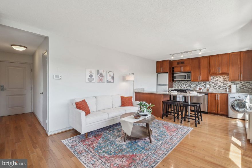 This inviting studio condo is perfect for those seeking a versatile living space. Whether you're looking for a primary residence, a cozy pied-a-terre, a creative studio, or a home office away from home, this gem has it all. The entire condo has been freshly painted, providing a bright and welcoming atmosphere. Newly refinished floors add a touch of elegance and offer easy maintenance. A full kitchen is included, equipped with all the essentials for cooking and meal preparation as well as a combined washer/dryer. An assigned parking space ensures convenient and hassle-free parking. The building is pet-friendly, allowing residents to bring their beloved furry companions 50 lbs. or less. Common laundry can be found on each floor of the building. Building amenities include on-site building management, pool, garden, tennis courts, fenced-in dog park, and BBQ area. All utilities are included in the condo fee. You can easily walk to Sligo Creek Park. Close to downtown Takoma Park’s shops and restaurants, easy access to I-495, only 2.5 miles to University of Maryland and less than a mile to the DC line. You can easily take the bus out front to Takoma or Fort Totten Metro. Future Purple Line stop will also be nearby.