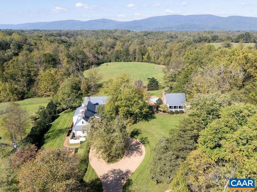 Temple Hill c. 1790 is an extraordinary revolutionary era estate in Western Albemarle comprised of 10.35 scenic acres. An exceptional & rare offering that has been thoughtfully renovated & expanded to incorporate modern luxuries while maintaining the property's historical integrity. Temple Hill offers breathtaking mountain and pastoral views, creating a picturesque backdrop that changes with the seasons. The main residence offers 4 bedrooms, 4 full + 2 half baths & 2 home offices. The guest cottage also serves as a pool house with a full kitchen & bath directly off of the pool for convenient entertaining. Located in Ivy with easy access to Rt250 & I64,  7 min to Crozet, 10 mins to Boars Head & Farmington & 10mi to UVA. Property features 5 working fireplaces, wide antique heart pine flooring, hand hewn exposed beams, vaulted ceilings, bricked patios, covered porches, pool, sports/tennis court, detached 2 bay garage, fenced paddock, equipment shed with feed room & option for 1 level living with 1st floor level primary suite. Part of the 2010 garden tour, Temple Hill enjoys beautifully landscaped grounds with formal gardens, cutting garden, and 100 year+ boxwoods.,Glass Front Cabinets,Granite Counter,Soapstone Counter,Solid Surface Counter,Wood Counter,Fireplace in Bedroom,Fireplace in Dining Room,Fireplace in Foyer,Fireplace in Great Room,Fireplace in Rec Room