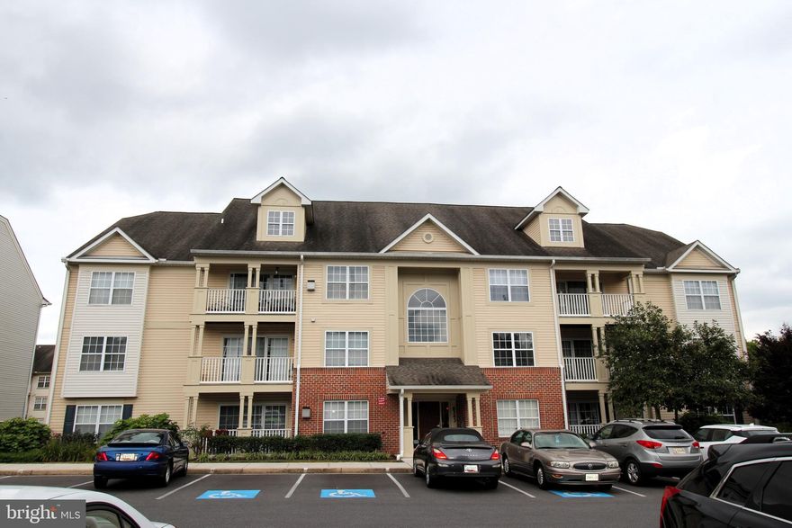 Beautiful Condo in Sought-After Spring Ridge! Welcome home to this second-floor condo in the desirable Spring Ridge community! Step inside to a bright and inviting space with a generous entryway, perfect for storing coats and shoes in the oversized closet.
This open-concept layout features a spacious family room with natural light, centered around a cozy gas fireplace. The kitchen offers ample counter space, all appliances included, room for a dining table, and direct access to your private balcony—perfect for morning coffee or evening relaxation.
The primary bedroom boasts excellent closet space and a private en-suite bathroom with a luxurious Jacuzzi tub. A second spacious bedroom and an updated full bath with a walk-in shower offer flexibility and comfort for guests or home office needs. A convenient laundry/storage room with washer and dryer completes the unit.
Enjoy the peace of mind of a secured building entry, plus all the incredible amenities Spring Ridge has to offer—a community pool, walking trails, tennis courts, playground, and more! All this and just minutes from major commuter routes.
Don't miss the chance to make this beautifully maintained condo your new home!