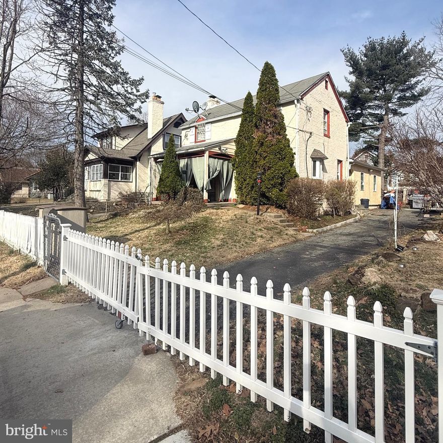 This well-maintained home with a second-floor apartment offers versatility for investors or owner-occupants.  The main level, accessible though the side entrance, features tile flooring throughout, a spacious living room with brick fireplace, dining room and an eat-in kitchen complete with granite countertops and a tile backsplash.  The main level also offers two bedrooms and an updated bathroom with a tile shower.  The finished basement provides additional living space along with a full bathroom with jacuzzi tub and laundry area.  

The second-floor apartment, accessed through the front door entrance, includes a full bathroom, two bedrooms, a living room and eat-in kitchen with pantry, offering comfortable and a private living space.  

Outside, the property features a fenced in yard and driveway, adding convenience and outdoor space.  A great opportunity with plenty of potential in a convenient Upper Darby location.  The home is being sold as-is, and the buyer is responsible for obtaining the use & occupancy certificate prior to settlement.  Please note: There is an additional lot associated with the property on which the garage is located; however, it is not included in sale.  The property line for this home ends to the right of the driveway and runs along the driveway to the fence behind the garage.