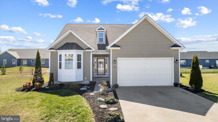 Stylish and spacious ranch-style home, with over 1,600 sq ft of living space on the main level, and full walk out basement below are ready for your vision.  The vaulted ceilings and open living area, complete with a fireplace and plank flooring, create a warm and inviting atmosphere that's perfect for both relaxation and entertaining. The kitchen with its functional layout, featuring shaker cabinets, stainless steel appliances, ample counter space, and storage , together with the addition of table space makes it convenient for casual breakfasts or hosting guests right in the heart of your home.
Large primary bedroom with a tray ceiling, ceiling fan, and full en suite bath is a peaceful retreat.  The separate soaking tub and shower add a touch of luxury.  And, let's not forget about the outdoor entertainment space! With over $20k invested, the block firepit area creates the perfect setting for enjoying summer evenings, whether you prefer quiet relaxation or hosting gatherings.  This home offers a perfect blend of comfort, convenience, and luxury, both indoors and outdoors.