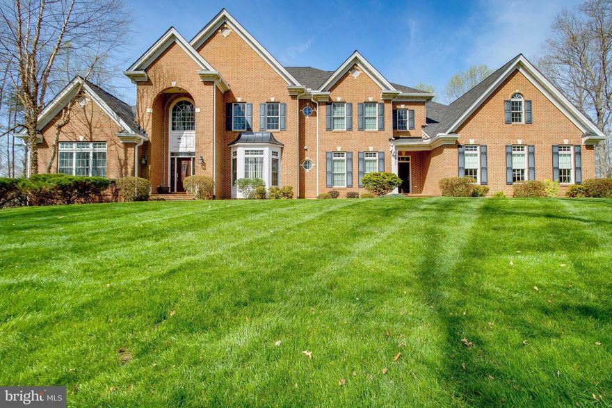 Amazing opportunity to purchase a truly one of a kind property in close in Nokesville location.. This custom built all brick estate home has over 9000 sq ft of finished living space with 3 car garage. The unique floor plan offers a beautiful main level with gourmet kitchen including double ovens. cooktop. upgraded cabinetry, and substantial  walk in pantry. Formal living and dining room, large family room off the kitchen, breakfast room leading to gorgeous covered porch, 1st floor guest suite are all amazing features of this stunning home. The first floor primary bedroom has a spacious walk-in closet with custom built ins, large owners retreat -spalike bath.  The dramatic 2 story foyer with curved staircase leads to unique second floor space complete with 3 additional ensuite bedrooms, large theatre/play room,  and additional game room.  A large in-law suite completes the top floor with separate living room, bedroom and full bath and private entrance. 

The back yard oasis features a beautiful inground pool, spa/hot tub, and oversized area perfect for entertaining and summer relaxation.  This is truly a rare opportunity to own such a gorgeous property so close to all major commuting routes 234, 66 and 28. Just minutes to VRE and easy drive to Gainesville, Manassas and Woodbridge/Dumfries. Must see to appreciate all this home has to offer! New roof 2021 and beautifully maintained.