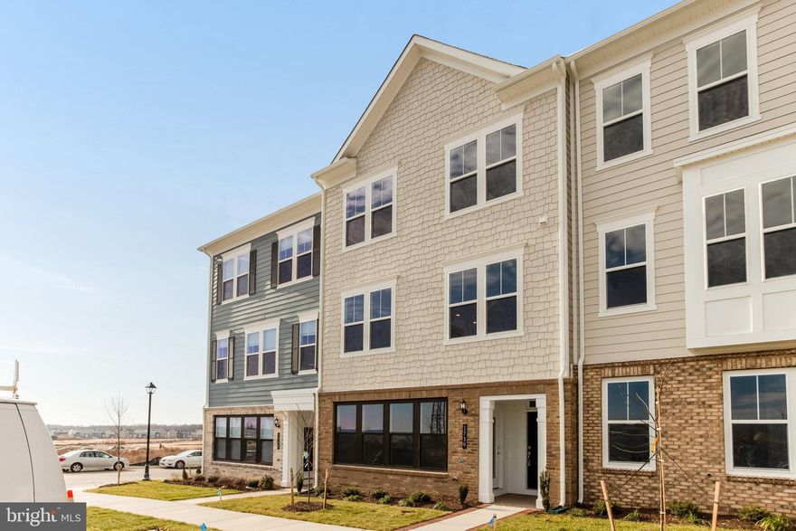 A new home for the New Year! This BRAND NEW townhouse located in the heart of Potomac Shores is HUGE! This spacious and luxurious 3-bedroom, 2-full bath, 2-half bath residence spans over 2600 square feet and features more than $56k in builder upgrades. It also comes with high-speed Verizon FiOS internet INCLUDED in the rent!

Upon entering, you'll be greeted by a huge main level office with an attached half bath, providing versatile space that can easily serve as an additional bedroom. The flexible layout continues with a dedicated flex space on the main level, perfect for an office, playroom, or exercise room. Luxury vinyl plank floors grace the main and kitchen levels, offering a sleek and modern aesthetic. 

Head upstairs to find the heart of this home - the enormous open concept kitchen, dining, and living room area, creating a perfect space for entertaining and daily living. The gourmet kitchen is a chef's delight, boasting stainless steel appliances, gas cooking, and a giant island with waterfall quartz counters. Whether you're preparing a family meal or hosting a gathering, this kitchen is sure to impress. Just off the kitchen you will find a sunny breakfast area that would also be perfect for a home office. From the kitchen you can step outside onto the great deck, an ideal spot for grilling and enjoying outdoor moments. 

The bedroom level features three generously sized bedrooms, with the primary suite featuring a tray ceiling, large walk-in closet, and an ensuite bathroom that defines luxury. The primary bathroom includes a dual vanity, a separate water closet, and a spacious shower with a convenient bench. The hall bath also features a double vanity, catering to the needs of the entire household. This level also includes the laundry room, complete with brand new washer and dryer.

The oversized two-car garage and driveway provide ample space for parking and additional storage. Plenty of street parking is available for guests. Pets are considered on a case-by-case basis. Additional $500 pet deposit and additional $40/month per pet rent.

Don't miss this opportunity to enjoy everything that Potomac Shores has to offer. There's no need to pay for a gym membership! The Shores Club is an impressive social and recreation center featuring the Fitness Barn with a modern gym, movement studio, yoga lawn, Kids Club and eight-lane competition pool. The neighboring Social Barn offers a cozy living room, demonstration kitchen and family pool with sundeck, cabanas, kids’ pool and snack bar. Outdoor gathering space includes an outdoor patio, community garden, working greenhouse and event lawn.  There is also a Jack Nicklaus Signature Golf Course complete with  8,000-sq. ft. clubhouse, pro shop and restaurant and a 30-Acre Sports Complex includes both turf and Bermuda-grass soccer fields, a softball field and children’s playground. Discover endless opportunities to bike, walk, run, swim, golf, workout, canoe, boat, or enjoy a seat in front of the firepit at the Golf Club restaurant open to all Potomac Shores residents. Walk throughout the treelined community on over 85 miles of wide paved walking trails and gorgeous sunsets by the Potomac River.

Conveniently located near commuter routes, this townhouse provides easy access to transportation, as well as proximity to great dining and shopping options. Don't miss the opportunity to make this Potomac Shores townhouse your new home—schedule a viewing today and experience the epitome of modern living! Available immediately.