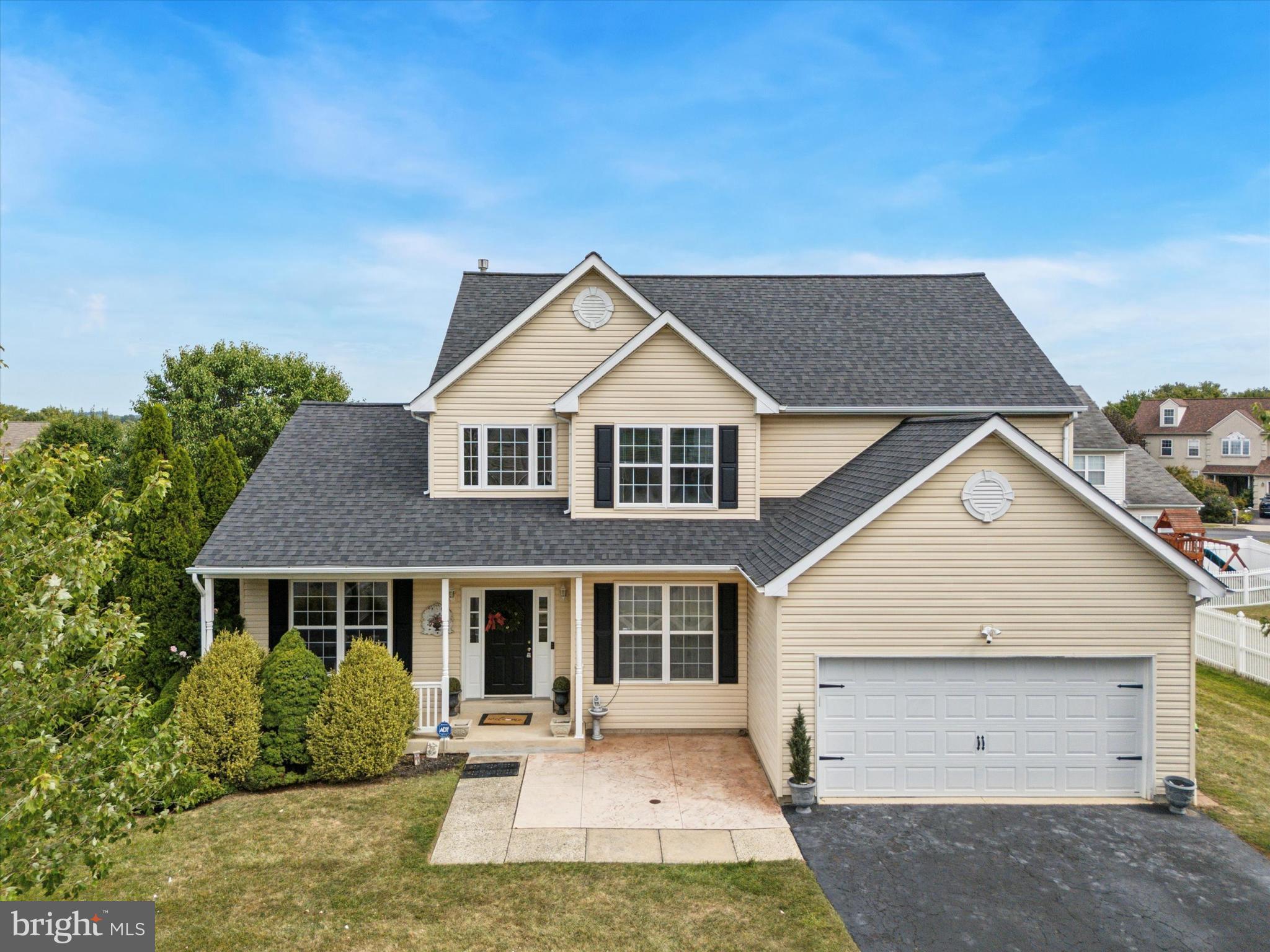 Welcome to 9 Crimson Drive, a beautifully maintained modern Colonial in the desirable Autumn Ridge community that combines style, comfort, and functionality. The inviting two-story foyer opens to a bright floor plan featuring a formal dining room, spacious living room, and a private home office. The kitchen with island, abundant cabinet space, and adjoining breakfast area flows seamlessly into the family room with a cozy fireplace. Upstairs, the expansive primary suite includes walk-in closets and a spa-like bath with soaking tub, dual vanities, and separate shower, along with three additional bedrooms and a full hall bath. The partially finished basement offers potential for additional living space with a built-in bar and plenty of storage, while a large attic with convenient pull-down stairs provides even more versatility. Outside, you’ll find a large deck, a concrete patio, a low-maintenance landscaped yard, and a shed for extra storage. Additional highlights include a two-car garage, a Generac whole-house generator for peace of mind, and a welcoming covered front porch. Conveniently located near shopping, dining, parks, and major roadways, this move-in ready home is the perfect blend of charm and convenience.