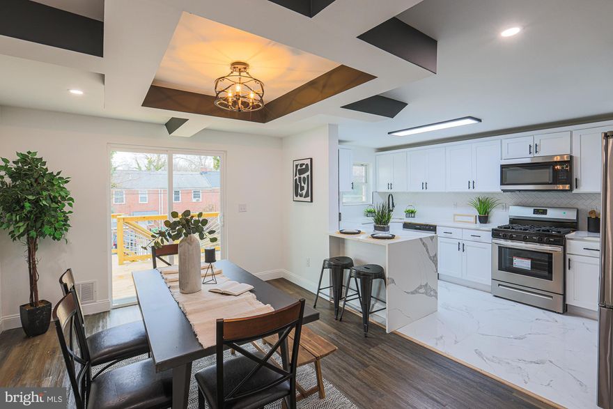 THERE'S SOMETHING TO BE SAID ABOUT BEING THE PROUD OWNER OF THE NICEST HOME IN THE SUBDIVISION. NO EXPENSE WAS SPARED IN THIS HIGH-END RENOVATION. 4 BEDROOMS 3.5 BATHS. CATHEDRAL CEILINGS.CHEF'S KITCHEN WITH WATERFALL GRANITE. TOP NOTCH APPLIANCES. OPEN FLOOR PLAN WITH EGRESS TO THE NEWLY CONSTRUCTED DECK. PERFECT FOR FAMILY GATHERINGS & ENTERTAINING.DESIGNER APPOINTMENTS INCLUDING, RECESSED LIGHTING, LED RIMMED LIGHTING IN COFFERED CEILINGS, INTERLOCKING FLOORING,NEW APPLIANCES,NEW WINDOWS.MASTER BEDROOM IS COMPLETE WITH LUXURY EN-SUITE, NEW HVAC & WATER HEATER, HIGHLY COVETED PARKING FOR 2 CARS. HURRY!