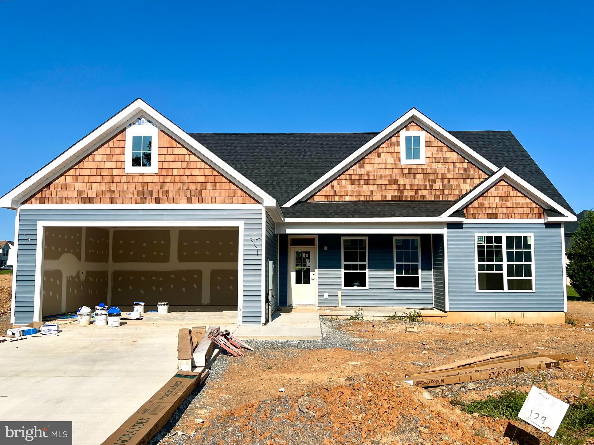 40 Day Completion Date! New ranch home with 1712 sq ft of living area. Large primary bedroom with walk in closet, tiled shower with double headed shower heads. Family room with cathedral ceiling open to kitchen and dining area. Upgraded kitchen cabinets with Island, granite counter tops, stainless steel appliances, built in pantry cabinet. Enjoy the 14x16 Sunroom that leads to a concrete patio. LVP flooring in main living area and in Sunroom. Carpet in the bedrooms. Premium elevation with stone accent. Ceiling fans in family room and in primary bedroom.