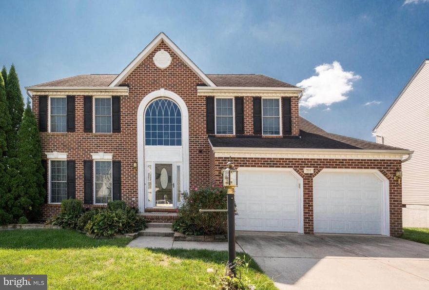 Professional photos coming soon! Welcome to this beautiful brick Colonial in a desirable enclave of the Hickory Overlook community! Perfectly situated on a premium lot backing to mature, year-round trees, this home offers privacy and a serene backyard setting. Step inside to a two-story entry with a cathedral ceiling, creating an impressive first impression. The open-concept floor plan is enhanced by gleaming hardwood floors, seamlessly connecting the main living spaces. The spacious gourmet kitchen features a center island, cabinetry, and ample prep space—ideal for both everyday living and entertaining. Adjacent to the kitchen, the inviting family room showcases a stone-surround gas fireplace, offering warmth and character. Entertain with ease in the formal dining room, while the elegant living room provides the perfect space to welcome guests.  Upstairs, the oversized primary suite serves as a private retreat, complete with an ensuite bath and generous closet space. Three additional bedrooms offer plenty of natural light and ample storage, accommodating family, guests, or flexible use. The lower level provides endless possibilities, including a separate room ideal for a home office, bedroom, gym, or playroom, along with a dedicated workshop and additional storage.  Enjoy exceptional outdoor living on the impressive 720 sq ft Trex deck, perfect for relaxing or entertaining, with a convenient staircase leading to a finished patio below, extending your living space outdoors.  Recent Updates: New roof and gutters (2025).  Ideally located just minutes from shopping, dining, and everyday conveniences, this stunning home combines comfort, style, and an unbeatable setting.