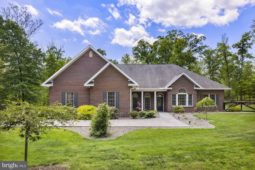 Custom-built brick rancher tucked away on a private dead-end street offering the perfect blend of seclusion, comfort, and quality craftsmanship. This beautifully renovated 3-bedroom, 2.5-bath home features 2,149 sq. ft. of open-concept living with soaring 9+ ft. ceilings, spacious primary with electric blinds, recessed lighting and a desirable split-bedroom layout with Jack-and-Jill bath. Extensive 2020 renovations include ceramic tile flooring throughout, a completely updated kitchen, new bath vanities, trim, doors, lighting, ceiling fans, fresh paint, landscaping, and more.
Enjoy year-round comfort with radiant heated floors throughout the home, including the sunroom and oversized 3-car heated and cooled garage. Additional highlights include abundant floored storage above the garage, whole-house humidifier, Bryant generator, and a 4’ insulated concrete crawlspace with Bilco entry access.
Outdoor living shines with a screened-in porch featuring stamped concrete and ceiling fan, mature landscaping with butterfly bushes and crepe myrtles, storage shed, and peaceful natural surroundings filled with wildlife. A rare opportunity to own a meticulous maintained, move-in-ready home in a truly private setting.