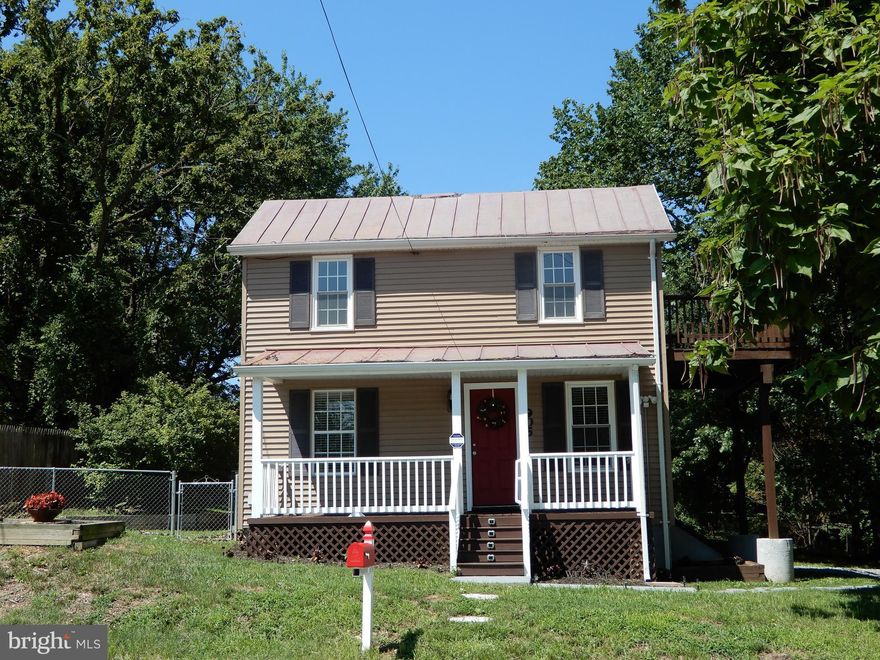 Beautiful 3 bedroom & 2 bath home on HUGE lot with your very own apple tree. The home features new roof-Oct 17,renovated kitchen, renovated baths, hardwood floors on the main floor, screened back porch, fenced backyard. deck off of master suite and a cellar basement. Located 259 ft from bus stop, walking distance to 2 metro stops and minutes away from the Beltway & DC. Do not miss this great deal!