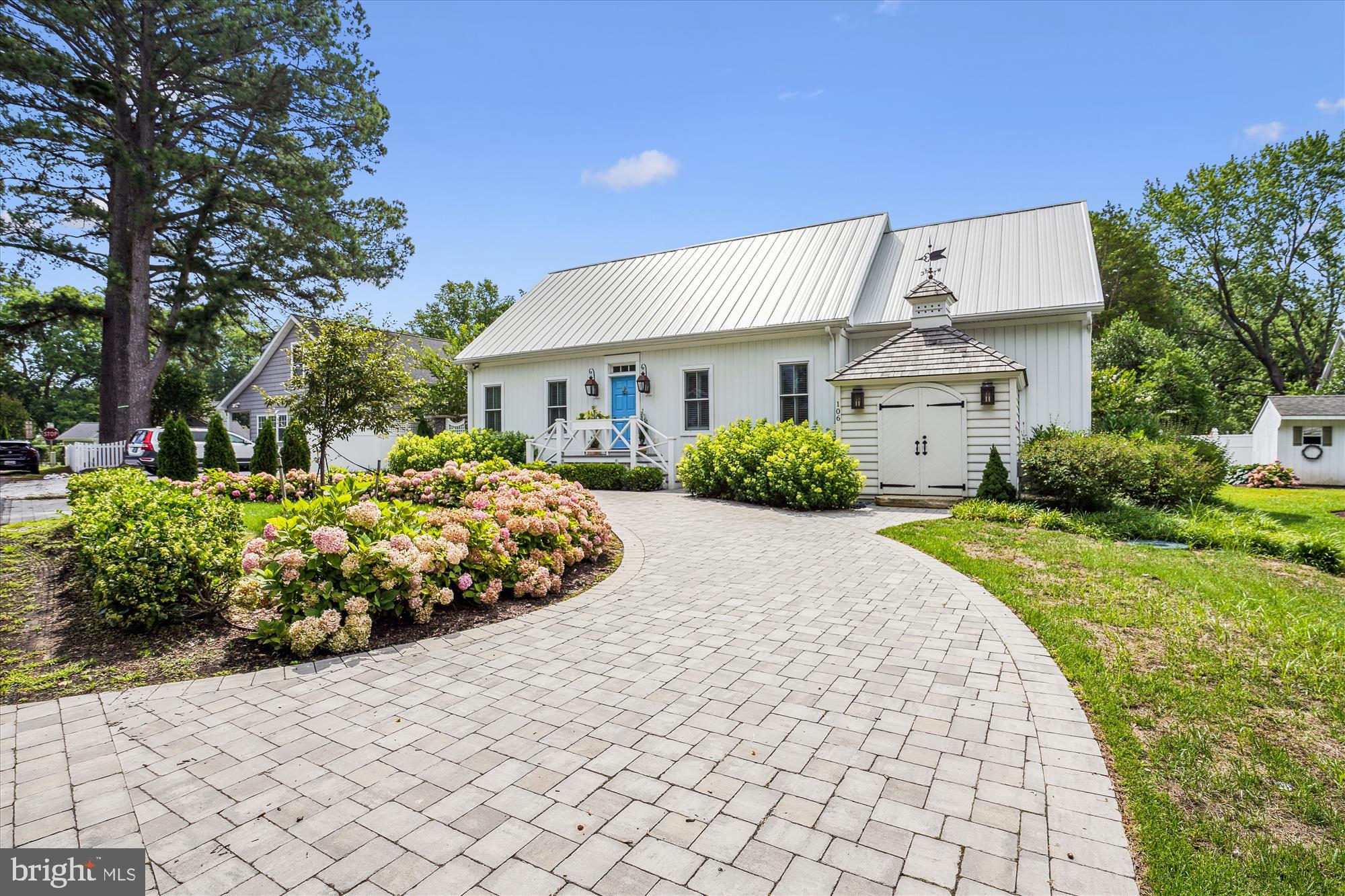 This charming home is on an exceptionally private street in St Michaels! Completed in 2020, it features a one-story layout with off-street parking, chic landscaping, private deck and charming rear garden.
Inside, the tall ceilings, spacious rooms, and incredible natural light create a luscious mood, from the wide entry to the grand living room with fireplace, luxurious kitchen, and fabulous dining room or second living room. The private spaces are equally inviting. The primary bedroom opens to the garden on one side and the closet and private bath on the other. There is a handsome second bedroom with built-ins and a second full bath as well.
This carefree home is a short walk from St Michaels' shops, restaurants, and hotels, and a town dock is steps away as well. It's a wonderful house, in wonderful condition and a better-than-wonderful location --- a very unique opportunity!