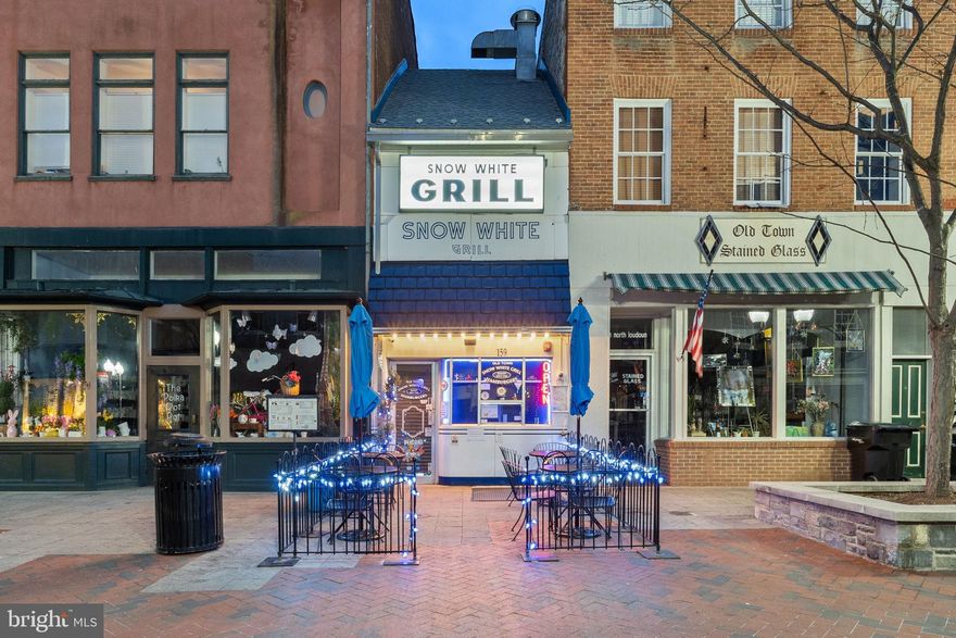 Opened in 1949, The Old Town Snow White Grill (The Snow White Grill) is a cherished establishment steeped in rich history and nostalgia.  So much so that the current owners purchased it as a retirement hobby business out of that very nostalgia; memories with parents, grandparents and friends, and also simply not wanting the brand to be lost to history.  

Since its inception, this iconic eatery has been a cornerstone of the community, serving up wonderful food and fostering a sense of camaraderie among locals and visitors alike.  Having fed famous diners such as Country Music’s Patsy Cline and Apple Blossom Grand Marshalls, and rich with stories, like when one couple trudged through a snowstorm after their wedding because they wanted the Snow White Grill to provide their first meal; the history of the establishment is unmet.

As Winchester has grown over the years, and still continues to do so, The Snow White Grill has remained a constant and has the potential, with full time ownership, to further an already established brand by taking it to the next level.  

Step inside and you will be transported back in time, surrounded by vintage décor and a welcoming atmosphere that harkens back to the days of yore. The walls of The Snow White Grill are adorned with memorabilia and photographs from Winchester’s past, and transports you to the classic burger joints of previous generations. 

Within the business, itself, the current owners have taken painstaking care to ensure the maintenance of the equipment, and care of the establishment out of deference for the history they cherish so much. If you’ve ever dreamed of opening your own restaurant and making a positive impact on the community you serve, this is the perfect opportunity for you!