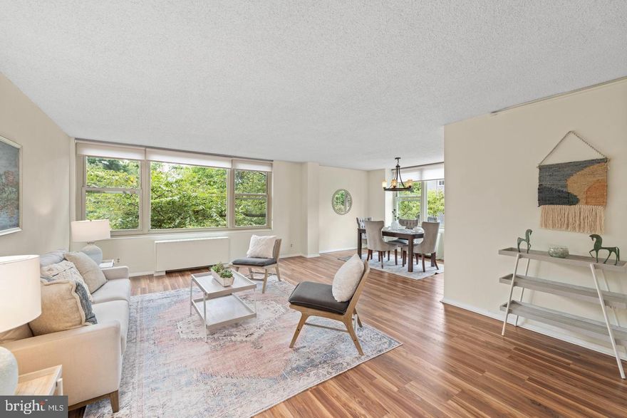 Welcome to your new home at 4401 Roland Avenue, Unit 115 in Roland Park! This charming 2-bedroom, 2-bath unit on the 1st floor, but 2nd level, boasts 1,343 sq ft of living space with new LVP flooring and large windows that flood the space with natural light.  Unit include gas stove, dishwasher & washer/dryer. Building is secured with key fob access and a staffed front desk. Parking is a breeze with a large lot, and additional laundry facilities are conveniently located in the building. Experience comfort and convenience in this midrise gem.