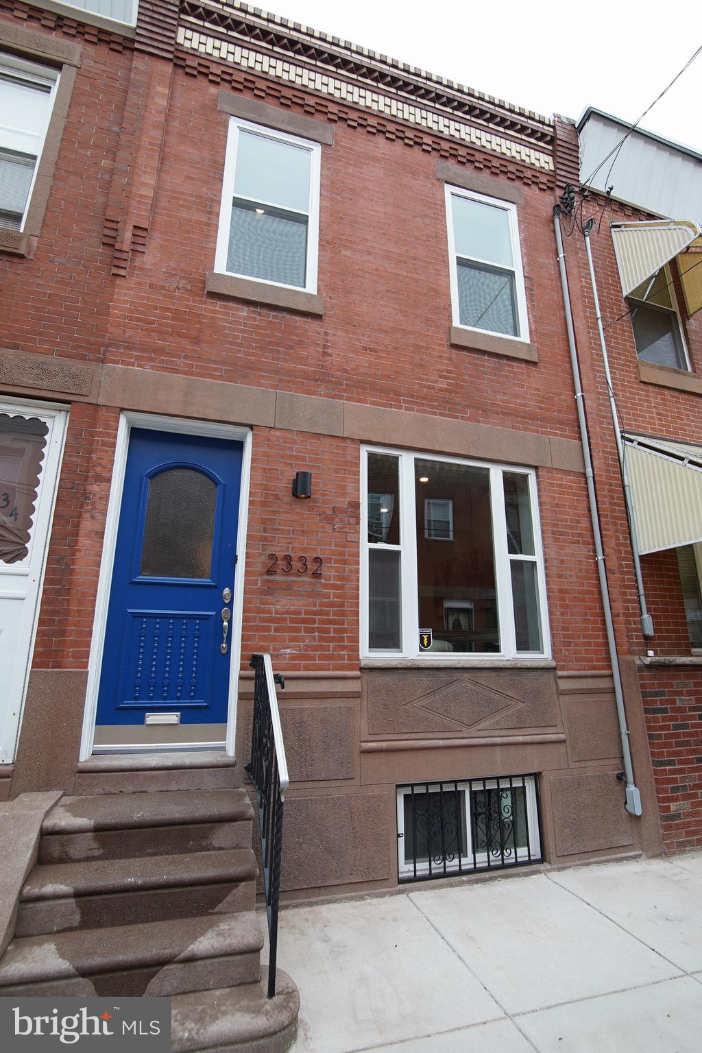Looking for the next elite home with the most unique amenities in the South Philadelphia metro area - welcome to 2332 S Bancroft Street! This home has been articulately redone from the front all the way throughout! Approach a prominent new front door and nostalgic brick facade. Enter into this straight-thru home to take in the newly laid flooring, modern recessed lighting, and exposed brick wall. The recessed lighting is sure to highlight the neutral tones and original molding throughout! This homes offers a generously sized living room and accompanying designated dining area. The kitchen shines with the latest set of stainless steel appliances, granite countertops, white shaker cabinetry and matching subway tiling. Modern shine and rustic, old world charm collide as you notice the additional countertops and custom wooden shelving. Additionally, there is access to and from a quaint, private back yard space through the formal laundry/mudroom. A powder room completes the first floor of the home! Upstairs are three spacious bedrooms each with ample storage and closet space for your belongings. Each of these rooms boast the same flooring and updates seen throughout. The master bedroom is a real treat - showcasing a custom designed wall with modern molding. The full hall bathroom showcases a shower/tub with sleek subway tiling throughout, and a hand picked vanity with cabinet space. Downstairs is a full sized lower level ready for your additional living space and touches. Furnish this space accordingly and in no time it will be feeling like your entertainment headquarters in no time! Location is everything nowadays and this home is a short walk from all the tastes and smell of Broad Street and the rest of South Philadelphia itself. With the purchase of 2332 S Bancroft Street, you will have all of South Philly at your disposal plus all the sights and sounds of Center City nearby!