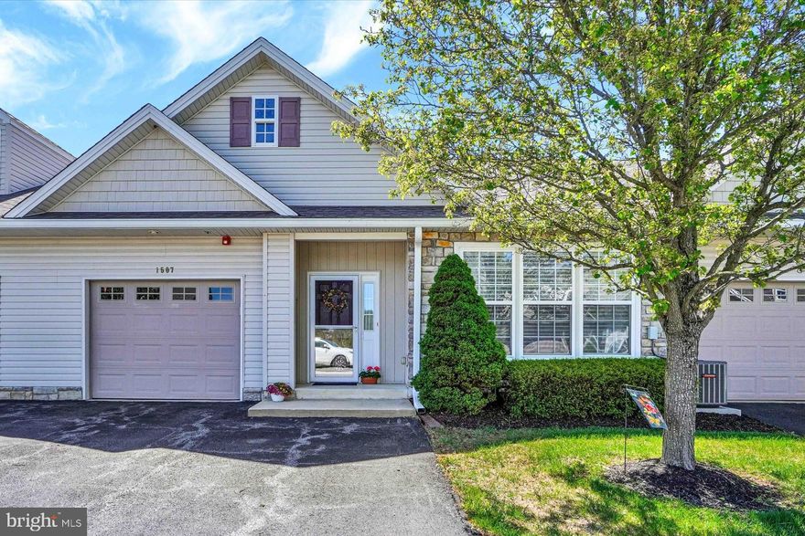 YES...this is one of the prettiest units ever sold in Bailey Springs! And it's not only the "upper level" layout that's so inviting; it's located in the one block where there's nobody below you and a rear walk-out slider to a patio. So this is one of the few units where you can enjoy outdoor living at ground level in the back of your home.  As soon as you enter the foyer you will experience the quality and appeal. Everything has been tastefully updated with neutral decor throughout, new custom blinds, crown and chair rail moulding, and beautiful engineered wood flooring in the main living areas. And check out the gorgeous new kitchen with white cabinetry with soft-close doors and drawers, under-cabinet lighting, updated appliances, and beautiful quartz countertops. The huge primary bedroom suite includes a massive walk-in closet and full bath. There's an updated ceiling fan, updated shower with a drop-down seat, and both baths have new comfort-height toilets with soft-close lids. The spacious second bedroom can double as an office, and the open floor plan is perfect for daily living and for entertaining. A laundry room with new white cabinetry provides terrific storage and opens to the oversized one-car garage, which also includes built-in storage. Gas furnace and A/C were updated in 2022, and the roof and gutters were replaced by the association in 2024. Truly, this is the nicest unit to come available in a long time. Don't miss your opportunity to make this wonderful home your own!