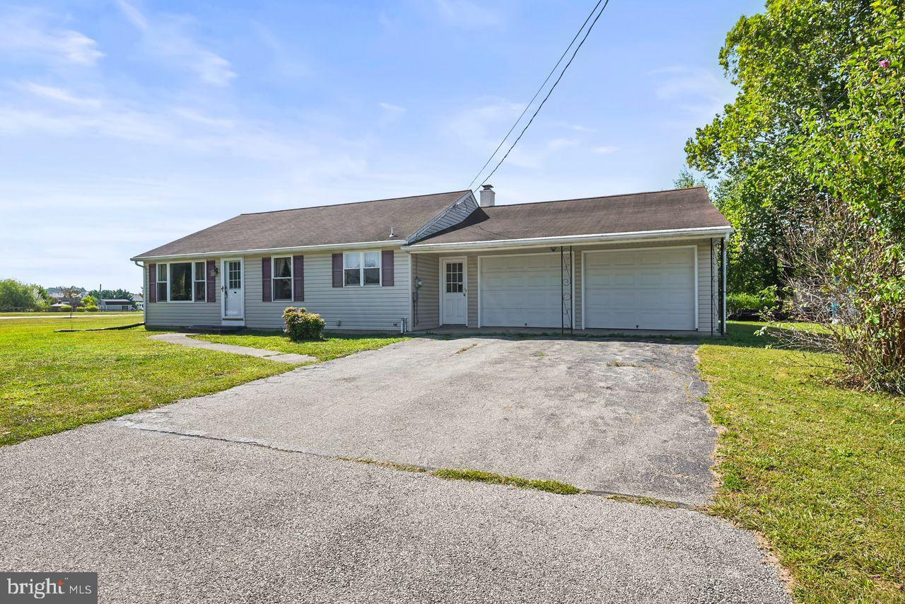 Are you looking for that "just right" house? Here it is! One-floor with an oversized 2-car garage and an unfinished basement with plenty of room for a workshop. 2 bedrooms, one full bath, big kitchen with a dining area and all the appliances staying, and a large living room. Do you like to hang out in the back yard? This home has a big, open space to make your oasis. The garage is a huge 600 square feet, the basement is 1080 square feet, and it has 200-amp electrical service. Plenty of parking in the driveway for 4 cars or more. Come take a look before someone else snaps it up!