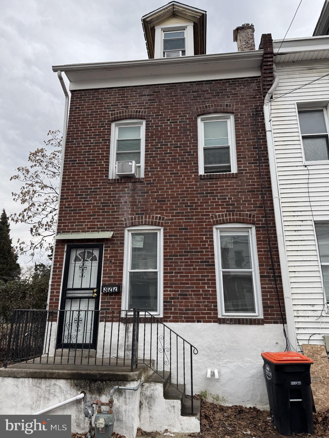 Tenant occupied 4 bedroom 1 bath end unit row. This home has been recently updated and is ready for it's new owner occupant or a great addition to an investor's portfolio. The first floor has a nicely sized living room in the front of the home, then a very large dining room in the middle and kitchen with laundry in the rear that leads out to the very large fenced in yard. The 2nd floor boasts 2 large bedrooms and oversized full bathroom. The 3rd floor has 2 additional bedrooms. This home can be delivered vacant if the new owner wants to occupy. Contact the listing agent for details. 24hrs. notice required for showings.