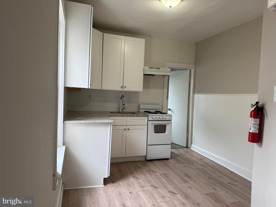 Welcome to 28 2nd Ave, Unit 2B, a beautifully updated second-floor apartment in the heart of Coatesville City! This newly renovated 2-bedroom, 1-bathroom unit features brand-new carpeting and a neutral paint scheme, creating a fresh and inviting atmosphere. The modern kitchen is outfitted with white shaker cabinets, granite countertops, and coordinating white appliances, offering both style and functionality. Located in a walkable neighborhood, this apartment provides easy access to local shops, restaurants, and public transportation. Don't miss your chance to call this move-in-ready space home—schedule your showing today! Pets considered on case by case basis with deposit & fee.  $1250 a month in rent plus $100 a month for water/sewer/trash.