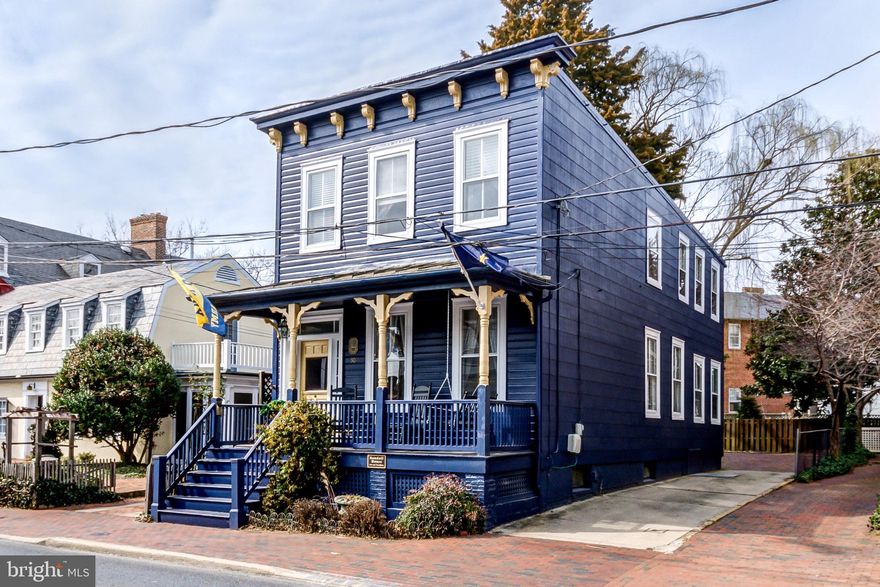 HISTORIC GEM in the heart of Downtown Annapolis with parking for 4+  cars!  Built in 1880, The Randall House has been primarily used as a B&B and can easily be converted into a private residence.  Located just steps  from the USNA Gate 1,  Downtown shops,  restaurants & City Dock, this house has been meticulously renovated with many modern appointments while maintaining its beautiful historic integrity. Features 4 BR, including large main level BR, 3 full Baths, refurbished hardwood floors throughout, enlarged Kitchen with second center island and checker tile flooring,  new upper level deck overlooking driveway parking for 4+ cars. Basement is partially finished.  This home was designed around entertaining featuring custom mahogany bar w/ seating for 6,  converted gas fireplace and decorated in impressive Navy tradition! Sit on the front porch and enjoy watching the Midshipmen, tourists and locals stroll by.  Furnishings included. Not available for showings on weekends due to rental commitments. Please call LA to show. Settlement mid June or after.