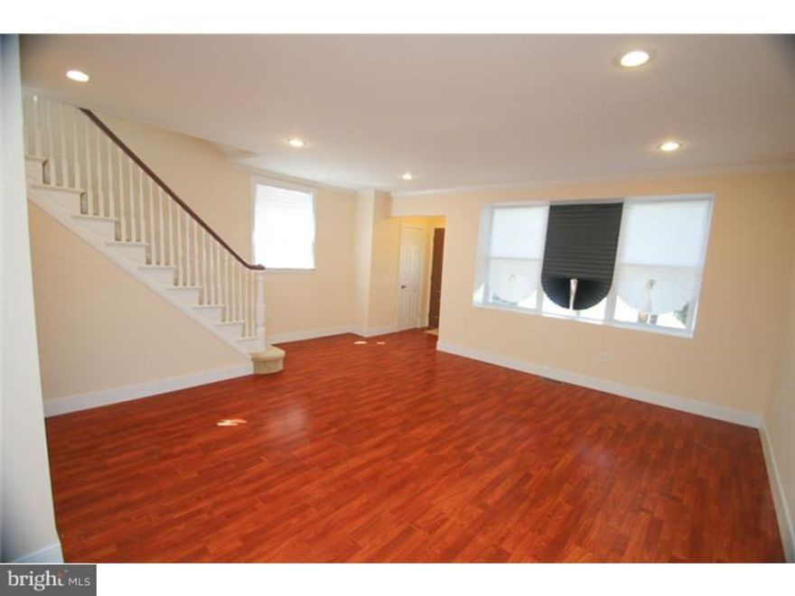 WOW! Look no further, good things come to those who wait! Unbelievable West Oak Lane Home Completely Knocked Out, ready for you to move into! Do you like elegance? Well this home is one of a kind and offers every extra a buyer can want. The entire home has new windows, a new roof w/ warranty, all new siding, updated electric & updated plumbing, and not to mention all new efficient Heating & AC Units! The 1st floor features a huge open layout with Brazilian Cherry floors, recessed lighting, a new kitchen, which features ALL NEW appliances! The upstairs features 3 good sized rooms, and a state of the art spa bath. The master features its own private bathroom as well! Other key features include a completely tiled full bathroom and a full finished walk-out basement for your convenience. There is also a deck off the kitchen, perfect for entertaining! This home truly has it ALL and is a MUST SEE!