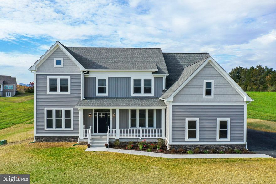 Immediate Delivery - $5,000 .00 towards closing costs with preferred lender.  BRAND NEW CUSTOM HOMES nestled on 2 acres in the tranquil estate of Cannon Hill Farms in Middletown with convenient access to I-81 and I-66.  Amazing views of the sun rising over the Blue Ridge Mountains and spectacular sunsets over the Appalachian Mountains.  As you enter your home, you are greeted by the openness of the home with the study off to the left and the first-floor bedroom to the right.  The hallway takes you back to the open floor plan inviting you into the spacious Great Room, kitchen and room, and a private dining room.  With 3,300 fin sq. ft. between the main level and upper level, the architect and builder have designed the home to meet their buyer's demands for usable space.  There is even a large unfinished attic room off of the master bedroom closet for storage.  The gourmet kitchen is equipped with higher-end appliances, including a 30” gas range; a combination wall oven and microwave, and a 27 cu. ft. French door refrigerator.  Plenty of recessed lights, and a coffered ceiling in the Great Room with a gas fireplace.  The engineered hardwood floor boasts 6” wide planks and is purely beautiful as soon as you walk through the front door.  Hardwood stairs take you to the upper level which has four bedrooms and 3 bathrooms.  You have to see the views for yourself from the windows!  The Primary bedroom bathroom has been upgraded with large tiles plus the shower is well oversized.   Not only is the interior and views amazing, but the exterior of the home has a wide full front porch that you can sit on or even install a swing and enjoy the scenic views.  The icing on the cake is that this home comes with a three-car garage.   You can landscape your yard to your heart's content and enjoy it just the way you want it.   SEE ALL DOCUMENTS ATTACHED FOR THE HOME.   Interior views of the exterior are similar to this home.