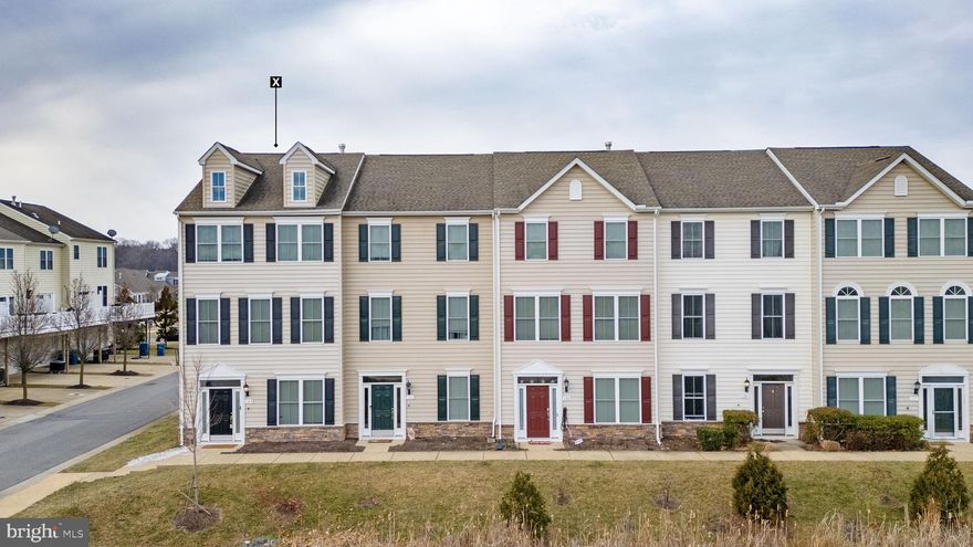 READY FOR SUMMER??? You must CHECK OUT this STUNNING HOME located in the amenity rich, water oriented community of Ellendale. Minutes to all Kent Island's favorites, and right off the Chesapeake Bay Bridge, this lovely home has so much to offer! A true FOUR bedroom END UNIT and MOVE IN READY!! Why wait? Come see it ASAP!!  As you enter you'll appreciate the well maintained appearance, with gleaming hardwood floors! Find a full en-suite bedroom with full bath on this level. Use it as an in-law, Jr suite, or office! It's versatile!! Step onto the 2nd level and the lovely hardwood floors continue. The family room is large, and being an END UNIT it provides additional windows allowing the natural light to flood right in!! A cozy fireplace welcomes you for the chilly, end of year months (but we will not focus on that, let's stick with summer vibes!!!). The kitchen flows right on with a large island, granite countertops, updated appliances, and slider to the LARGE deck to enjoy a cup of coffee, a glass of wine, or a summer BBQ! Being an END UNIT provides you more privacy as well! Lots of space for a FULL SIZE dining room table in your kitchen/dining room combo space! Half bath and laundry located on this level also! Keep moving onto the 3rd level which brings you to the MAIN primary suite! Larger than most, with the vaulted ceilings, and being an END UNIT you have extra windows here so this room feel even bigger! The en-suite bath has dual sinks, walk in shower and separate soaking tub, this is larger than most!! The other side of the home brings you to the last 2 bedrooms, which are both very spacious, and a full bath shared by both! Every room has a ceiling fan keeping you cool all year long! THIS IS A 10++++! Do not miss!!
