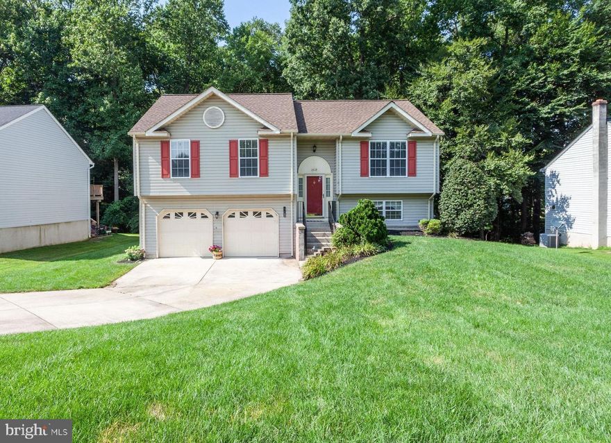 Updated split foyer in Havre de Grace.  This beautiful home is made for entertaining!  The upper level features a open living room, adjacent to the stunning remodeled kitchen.  Shaker style cabinets, subway tile back-splash, granite counters and LVP (Luxury Vinyl Planking) flooring make this kitchen crisp and bright.  Take a seat at the island for a quick breakfast or enjoy a full family dinner in the attached dining area.  The main level is completed by an owners bedroom with attached full bath and walk-in closet, 2 additional bedrooms and full bath in the hallway.  The basement offers plenty of space to chill-out with a spacious family room and half bath.  In the two car garage, you'll find the laundry room, workbench and storage space.  Enjoy the backyard from the double tiered deck that overlooks a serene wooded area. Updates include: full kitchen, updates to the hall bathroom, fresh paint.