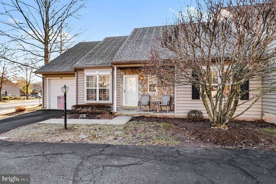 Don’t miss this wonderful 2-bedroom, 2-bathroom home located in the highly sought-after 55+ Gwynedd Commons community in Upper Gwynedd Township. Designed for comfortable one-floor living, this unit offers generous space and a thoughtful layout throughout. The main level features a bright eat-in kitchen with hardwood floors, oak cabinetry, ample counter and cooking space, and a separate breakfast/dining area. The kitchen opens seamlessly to a cozy den with a gas fireplace and a second access point to the rear deck—perfect for relaxing or entertaining. The spacious living room also boasts hardwood flooring, full-length windows with lovely community views, and plenty of room to gather with family and friends. The primary bedroom offers high ceilings, neutral décor, a walk-in closet, and a private full bathroom. A well-sized second bedroom is conveniently located near the full hall bathroom. Additional highlights include a main-floor laundry room with a stackable washer and dryer, a separate laundry tub, and excellent storage options. The full basement provides abundant storage and offers great potential to be finished into additional living space. Enjoy outdoor living on the covered front porch or the large rear deck, complete with a grill. The home also includes a one-car attached garage and convenient overflow parking nearby. The low monthly fee of just $220 covers lawn care, snow removal, trash service, and common area maintenance. Gwynedd Commons is ideally located within walking distance to a nearby shopping center—featuring a grocery store, bank, pizza shop, hair salon, and more—and is just five minutes from the Pennsylvania Turnpike.