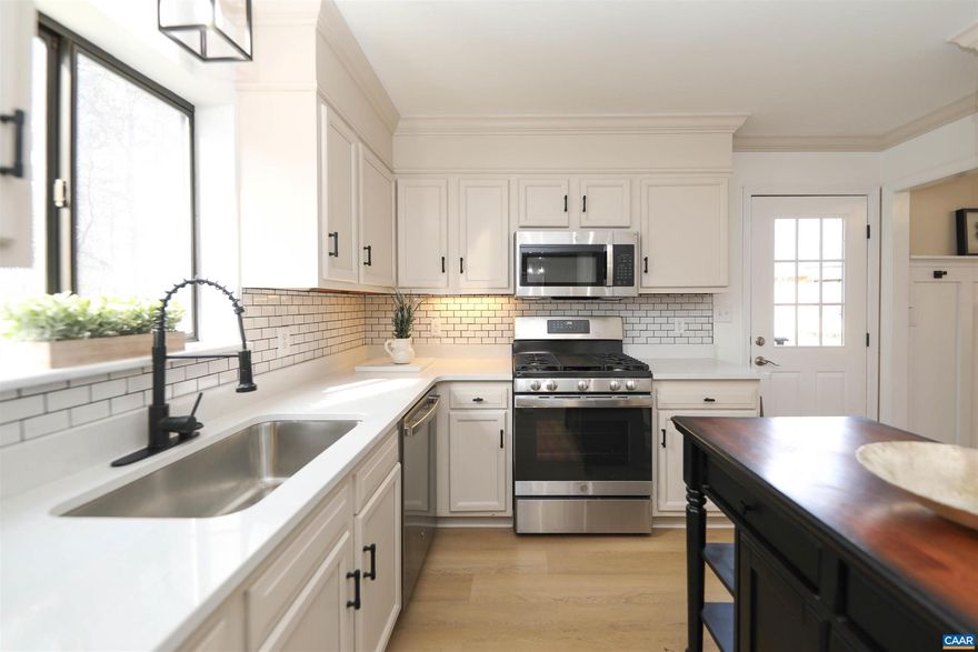 Requesting any interested buyers submit offers by 11:00 Sunday 3/24. Reimagined elegance with sophisticated traditional appeal balance this Mill Creek 5 Bedroom 3 full bath home beautifully. If New Construction is what you desire; but don't want to wait; then look no further!  Dual Primary Suites on both the main level as well as the fully finished terrace level.  Kitchen with Tile backsplash, granite counters, GE Gas 5 burner range, Microwave & Dishwasher.  Luxury vinyl Plank flooring throughout. Custom Bathrooms all feature ornate tilework, tubs & fixtures for variety of design elements and function. Primary suite on Main Level as well as formal dining room flow to the 12x35 deck with private wooded & mountain views! Expansive terrace level deck is expanded to 20x35 with access to driveway & community walking trails. So much more to see and love; check out the special features & come see in person!,Painted Cabinets,Quartz Counter,Wood Cabinets,Fireplace in Basement,Fireplace in Family Room,Fireplace in Living Room