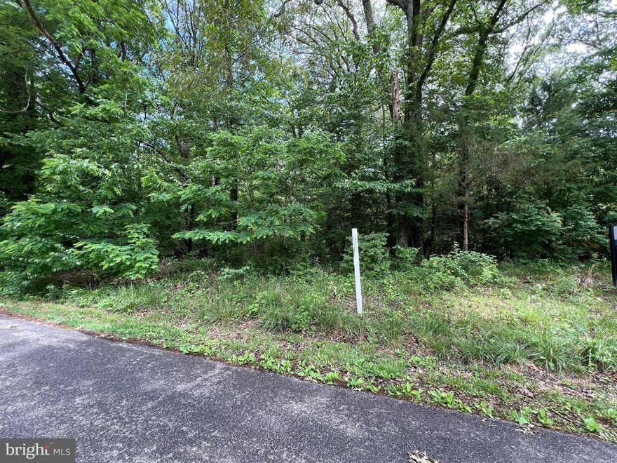 Pending but happily accepting back up offers! 
This is the land you have been waiting for. It’s perc tested and ready to go! All documents including a plat are available. The hard work is done. Just find a builder or use ours and get to building! It’s a larger than average lot for the community and perfect for the home you have been building on pintrest. It’s fairly flat and sits a couple feet higher than the road for great aesthetics!  The community offers beaches, a boat ramp, community center and it’s all a short drive to PAX, DC, and Annapolis. This is a great deal and it’s the perfect time to build. 
If you need a builder, we are happy to recommend some.